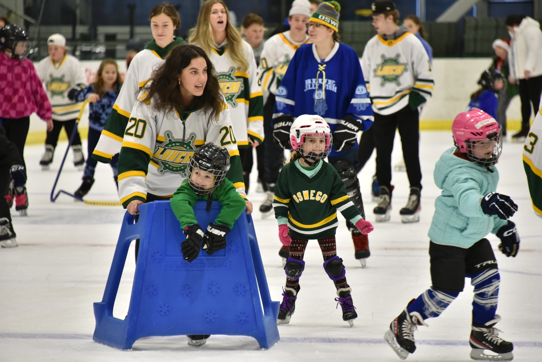 Rheya Zemlak (pictured), a sophomore on the Laker women's ice hockey team, is one of the many Oswego students to provide some fun open skating for the community Dec. 10 during the annual Holiday Skate with the Lakers in the Deborah F. Stanley Arena and Convocation Center. The popular community event with SUNY Oswego men's and women's hockey teams includes a visit from Santa Claus and chances to win a Laker hockey jersey. 