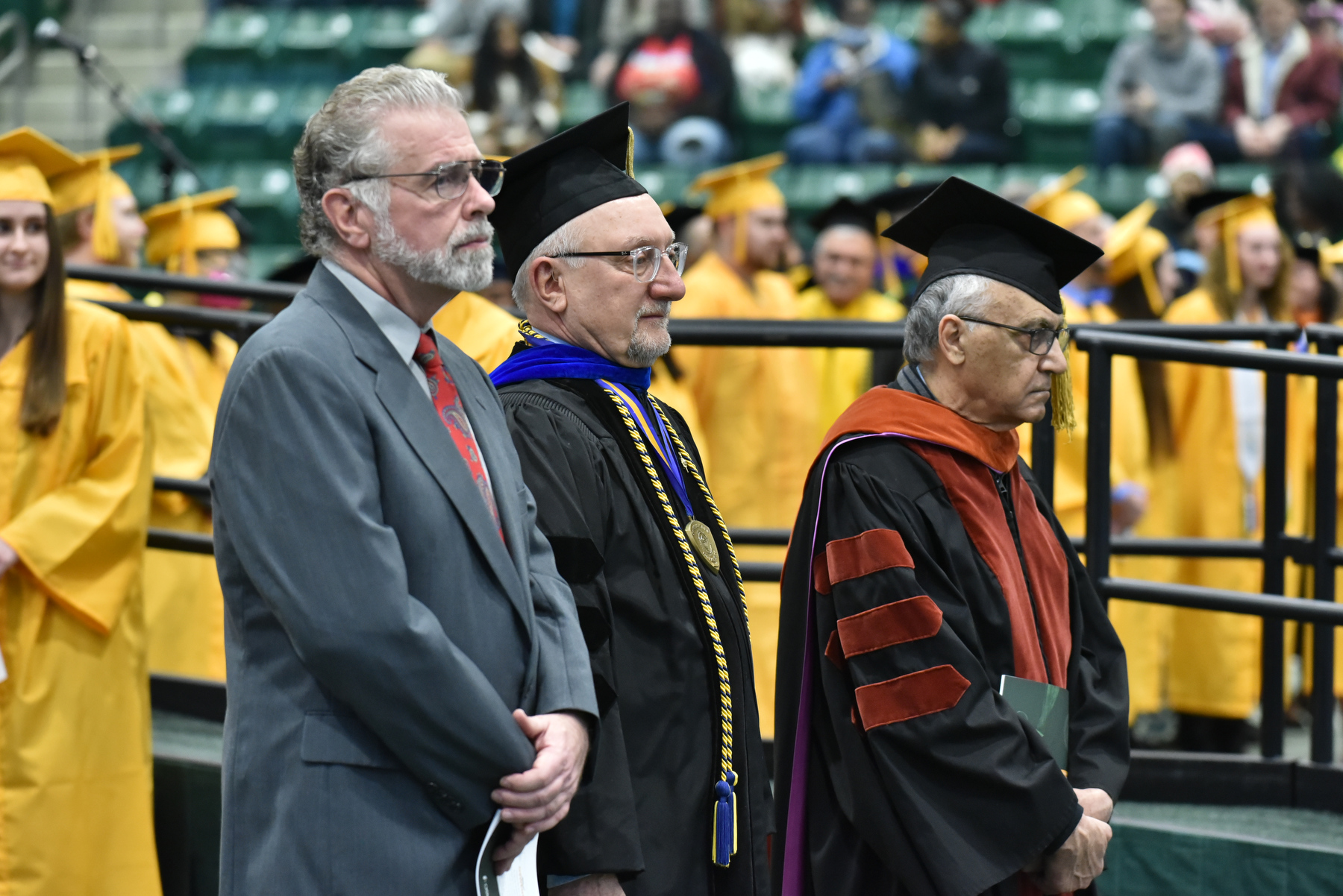 Retiring faculty and professional staff are honored at each Commencement. Pictured are Michael Pisa, Campus Technology Services; David Bozak, professor in computer science and psychology; and Said Atri, professor of economics.