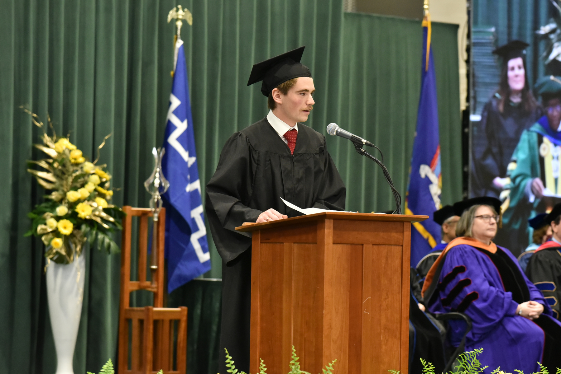Austin Davis, Student Association President and a member of the Class of 2025, provides the student address to the graduates.
