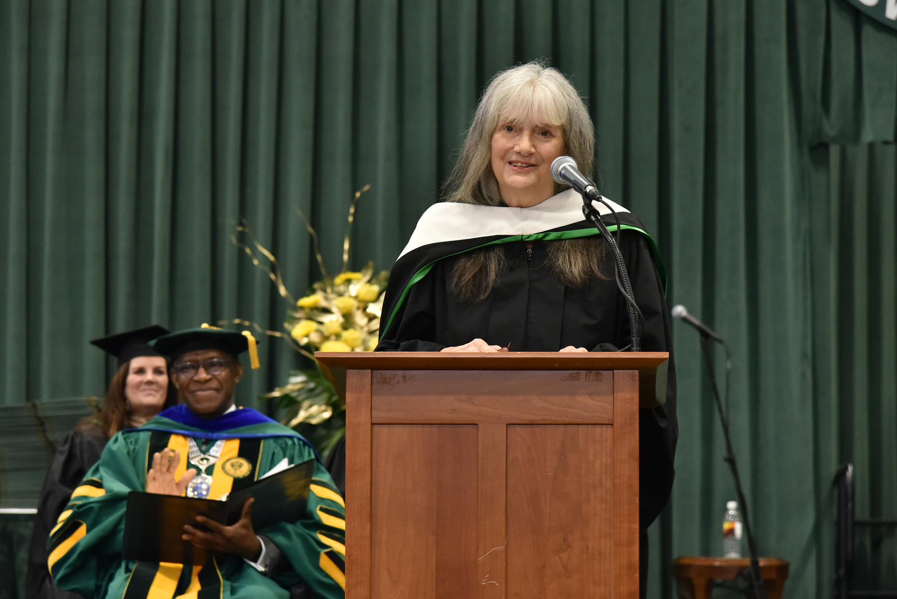 Virginia (Ginny) Donohue, a 1988 Oswego graduate and founder of On Point for College, served as a Commencement speaker, offering impassioned words of encouragement to the graduates after receiving a State University of New York honorary doctorate degree on the Commencement platform. Donohue left a corporate career and founded On Point for College in April 1999 after eight years of helping students from a local homeless shelter to enroll in college. 