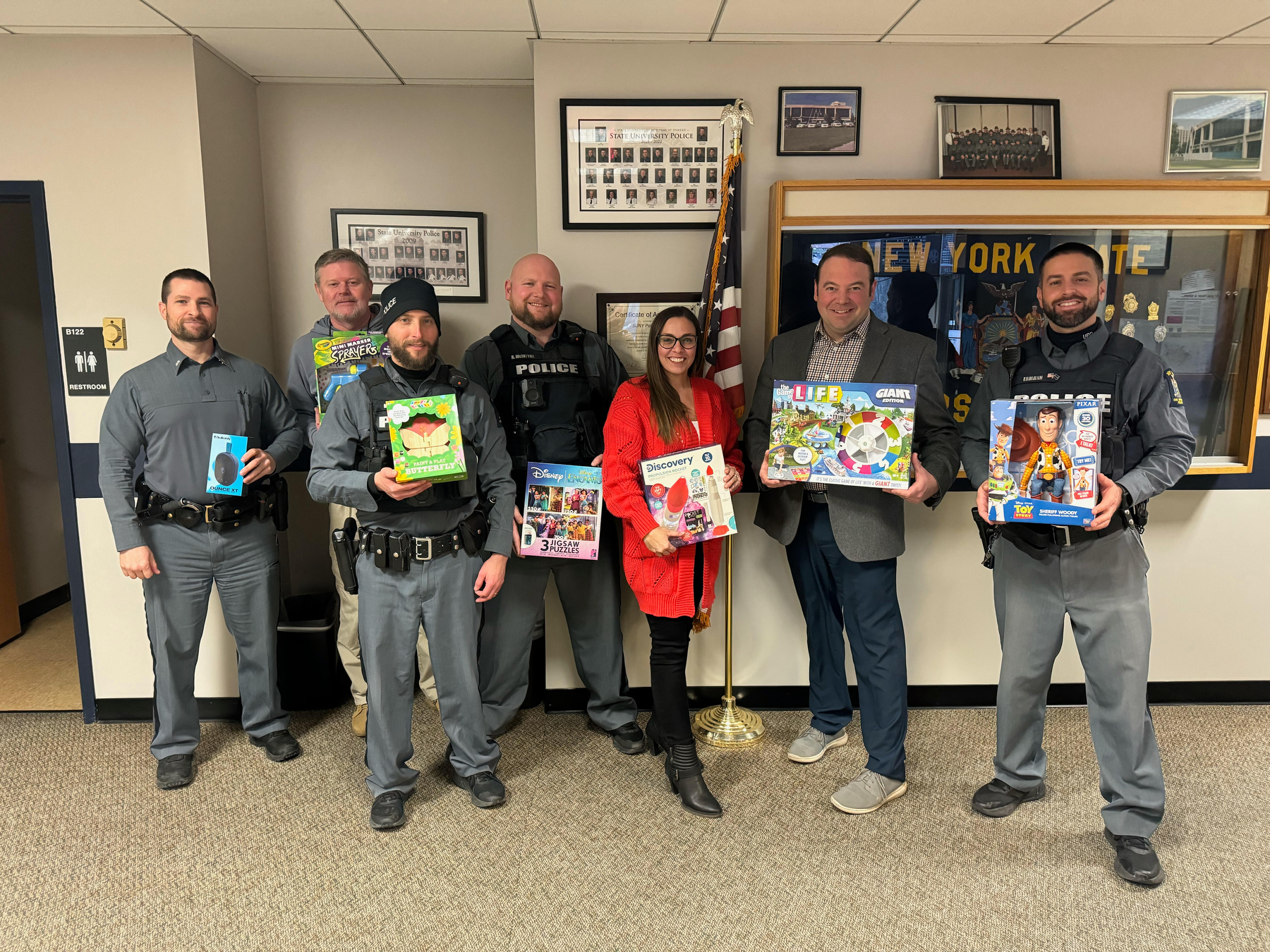 University Police and Parking Office staff donated over $2,000 in toys this December in support of the State Employees Federated Appeal (SEFA) committee-sponsored drive supporting the local Toys for Tots. Pictured with some of the toys and numerous gifts on final pick-up day are several of the dedicated officers and staff. In all, the SEFA Toy Drive collected more than $11,000 in gifts to support the Oswego County Children’s Fund that makes spirits brights for hundreds of local families.