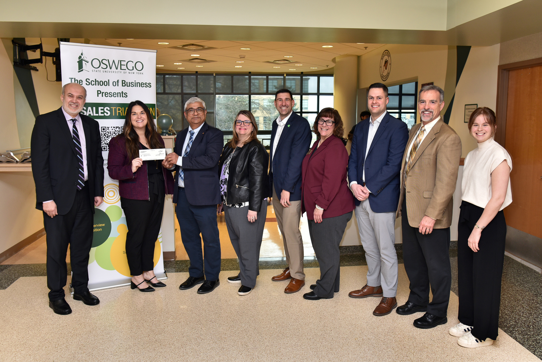 Enterprise Mobility presented their generous annual donation to SUNY Oswego Office of Career Services, with SUNY Oswego faculty and staff thanking them for the support.