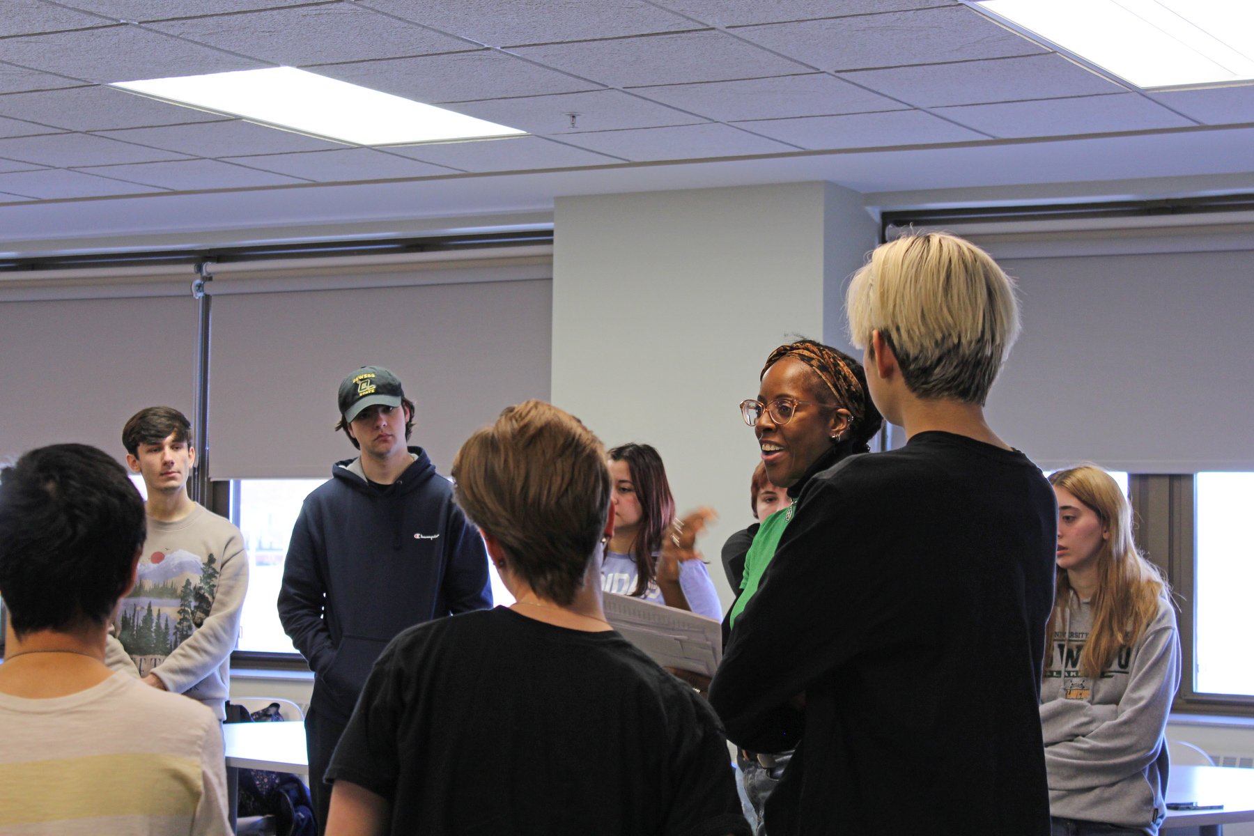 The five-member Actors From The London Stage touring company visited a number of classes across campus while in town to perform “A Midsummer Night’s Dream.” Actor Natasha Bain (pictured) visits Lisa Glidden's Global Politics class in Marano Campus Center. (Photo by Graceann Cleator)