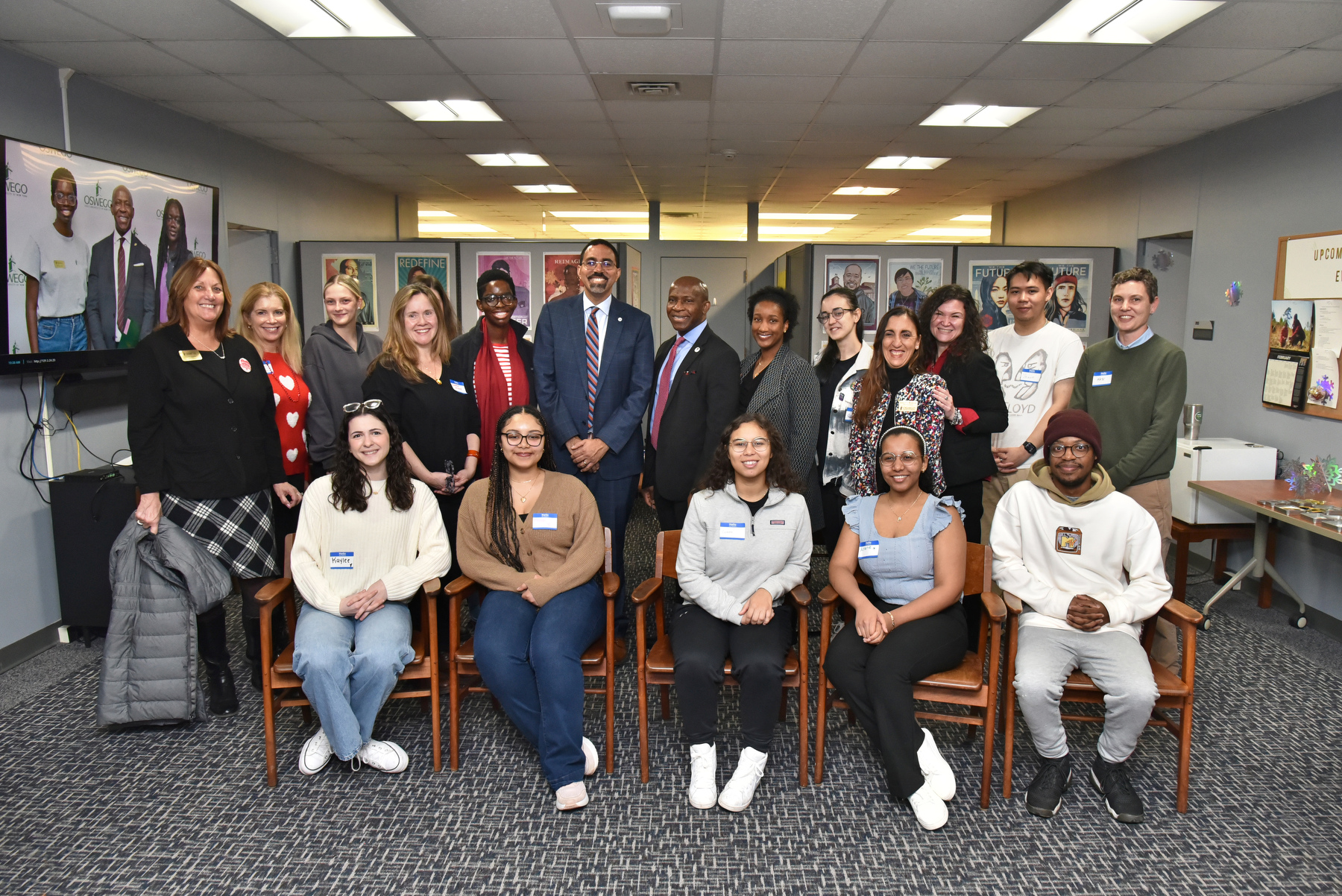 SUNY Chancellor John B. King Jr.’s visit to SUNY Oswego on Feb. 14 included a tour and a group photo with President Peter O. Nwosu and students, staff and faculty at the Triandiflou Institute for Equity, Diversity, Inclusion and Transformative Practice located in Penfield Library.