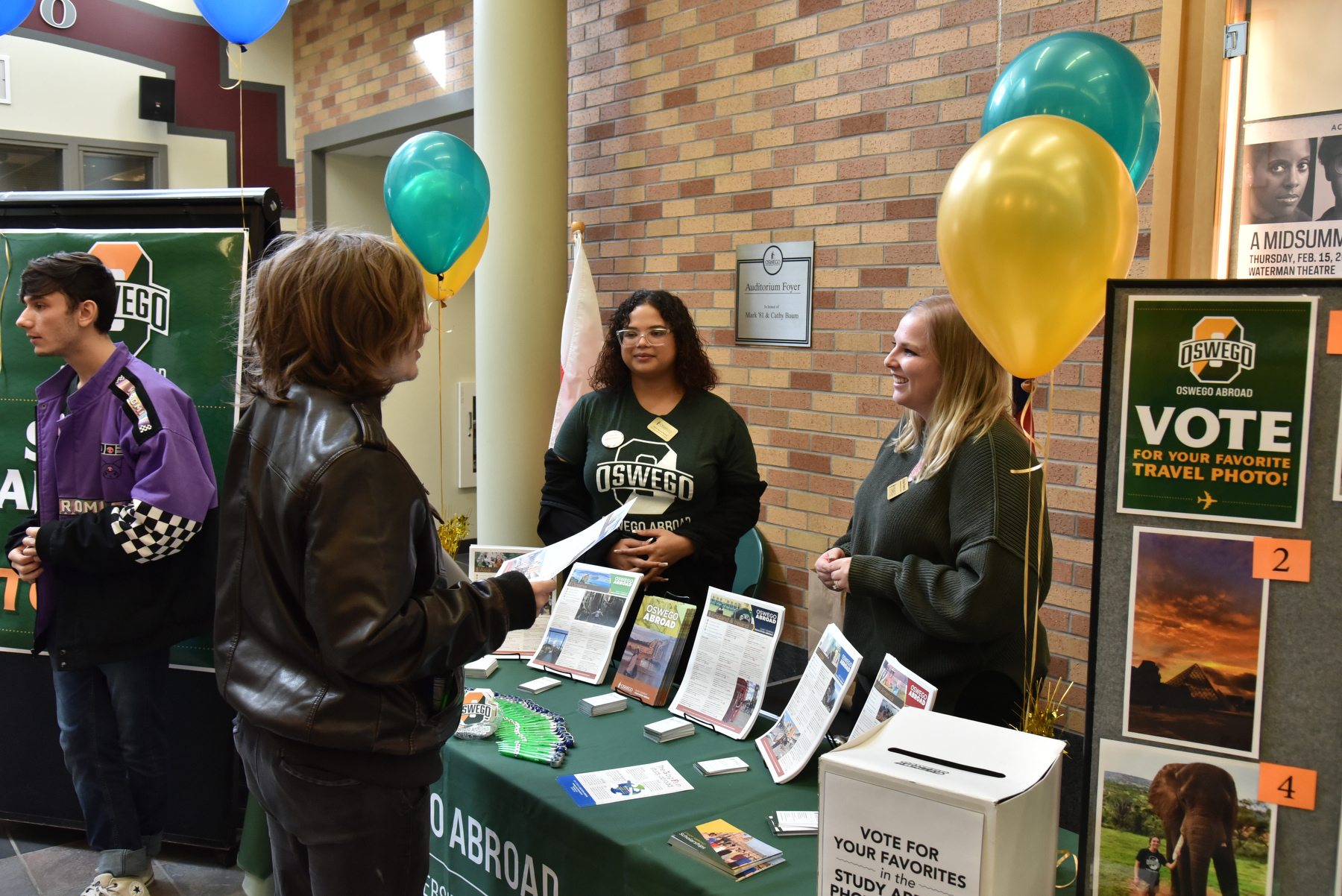 Interested students were invited to visit the Spring Study Abroad Fair Feb. 14 to explore faculty-led (one to three weeks) summer, semester, academic year and internship programs. Study Abroad has opportunities for all majors, all over the world. Psychology major Quinton Longworth, at left, gathers info about study abroad opportunities from one of SUNY Oswego's Study Abroad Mentors, Johnnise Crespo (center) of the global and international studies program and Alyssa Chamberlain from Education Abroad.
