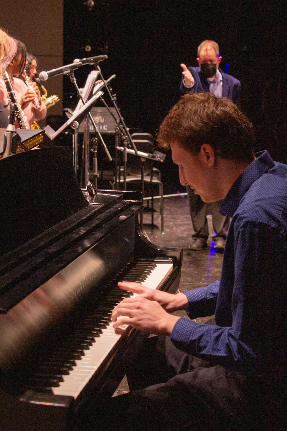 Student Angelo Antonelli plays piano along with the Oswego State Latin Jazz Ensemble directed by Eric Schmitz during the Music Department’s Collage Concert. 