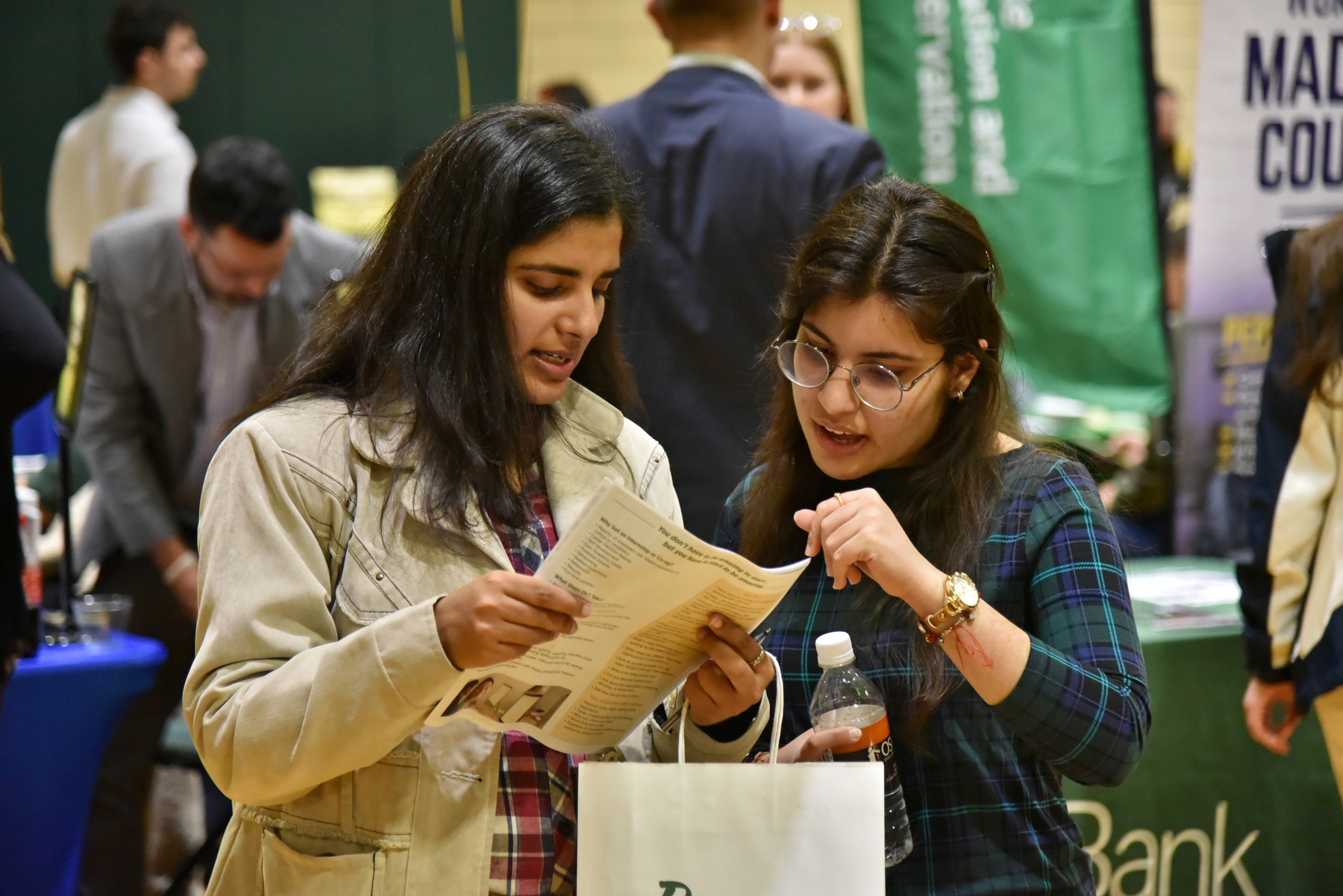 Sejal Nln, a senior computer science major, and Pranjal Manchanda, a senior electrical and computer engineering major, both international students from India, explore the Spring 2024 Career and Internship Fair where they had the opportunity to meet with over 100 employers and professionals. The event hosted by Career Services was held March 6 in the Swetman Gym, Marano Campus Center.