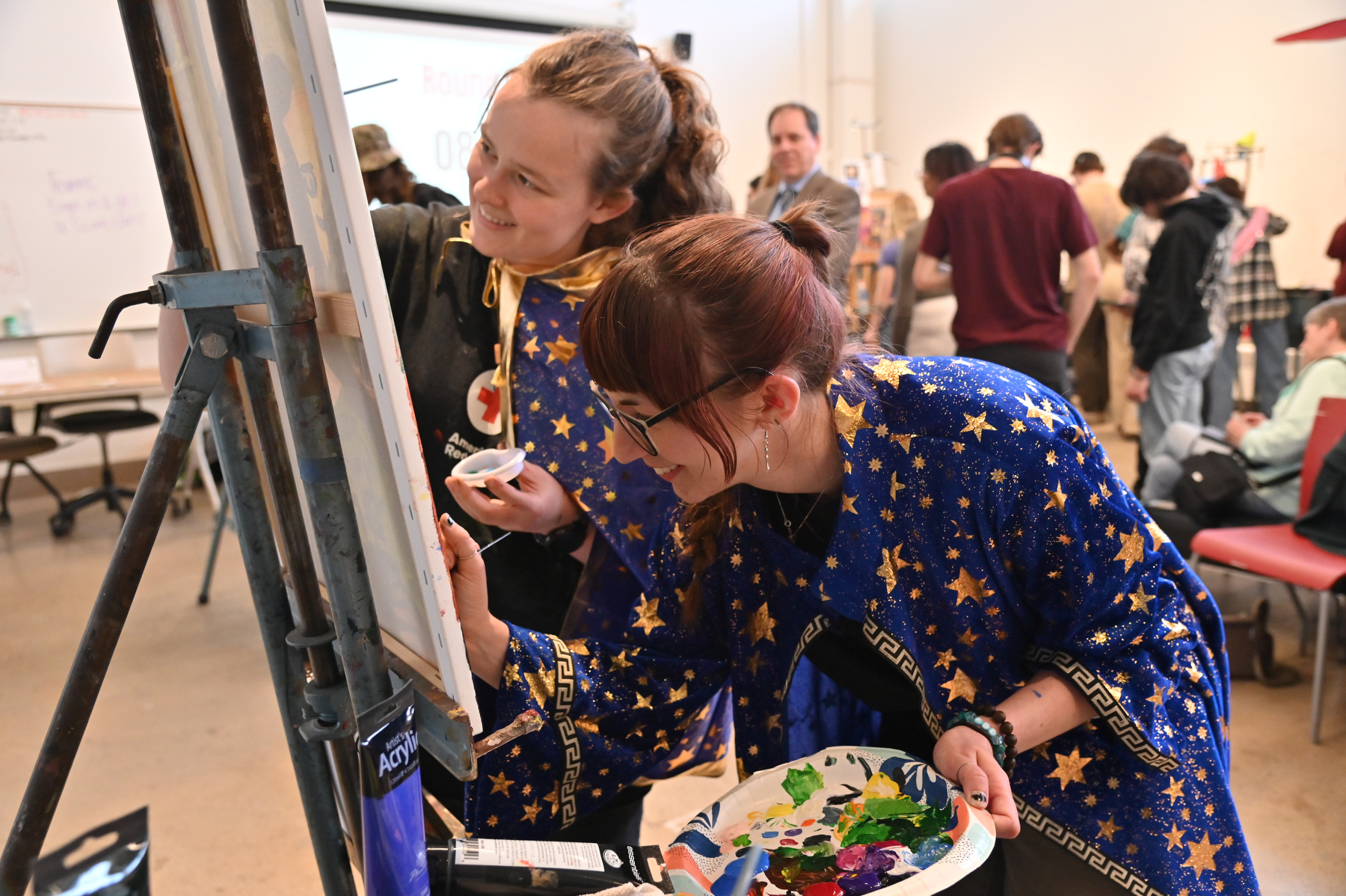 The SUNY Oswego Art Department held a fun and fast-paced "Championship Painting" event in the Tyler Hall painting studio during Quest, as students created fantastic paintings in a timed competition.