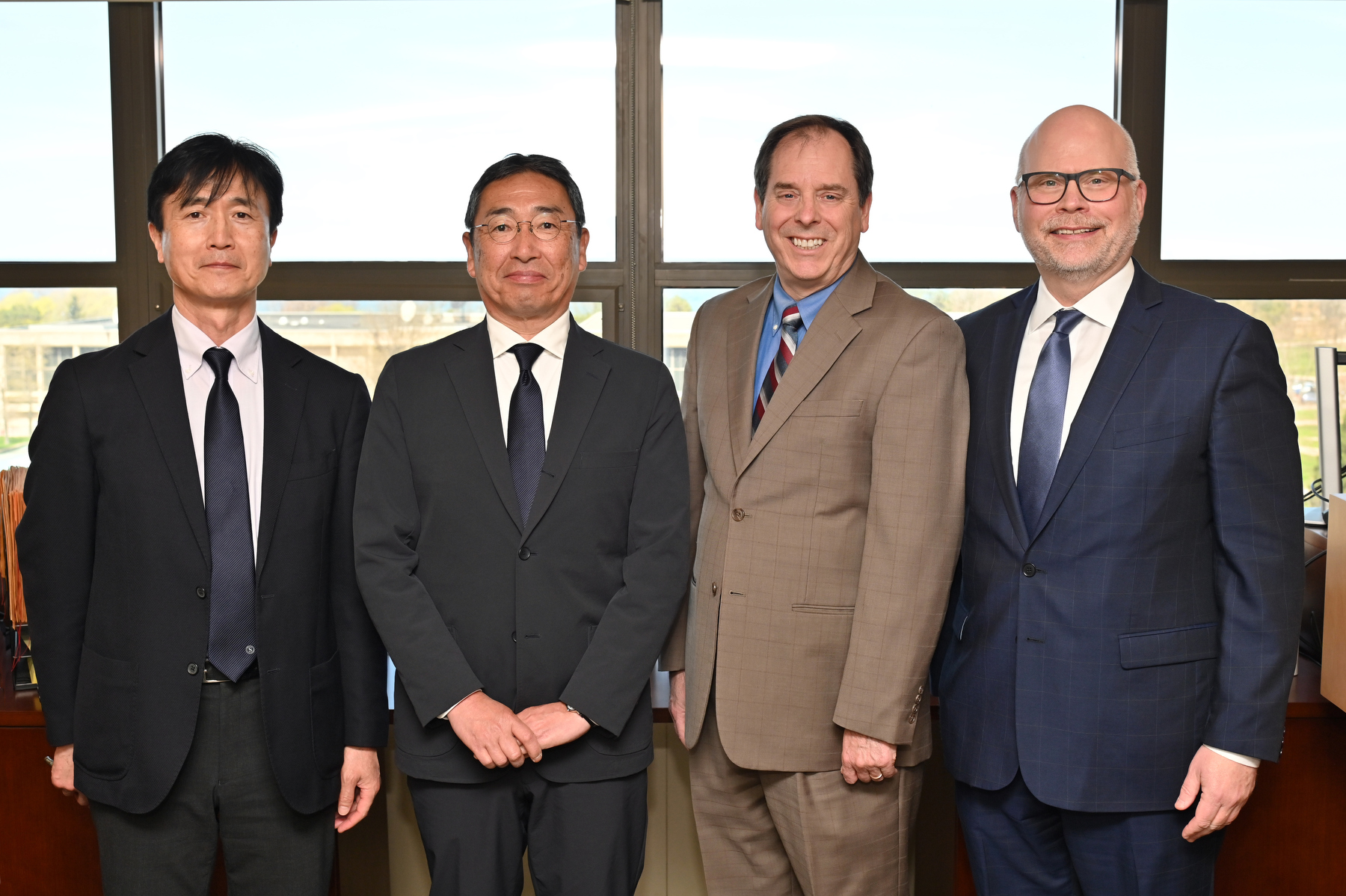 Administrators from the Yachiyo Shoin Junior and Senior High School in Chiba, Japan, visited campus April 30 for an official signing ceremony for a collaboration agreement with SUNY Oswego. From left: Tomoyuki Kaneko, vice principal, and Madoka Sakurai, principal, meet with Scott Furlong, provost and vice president for academic affairs, and Joshua McKeown, associate provost for international education and programs.