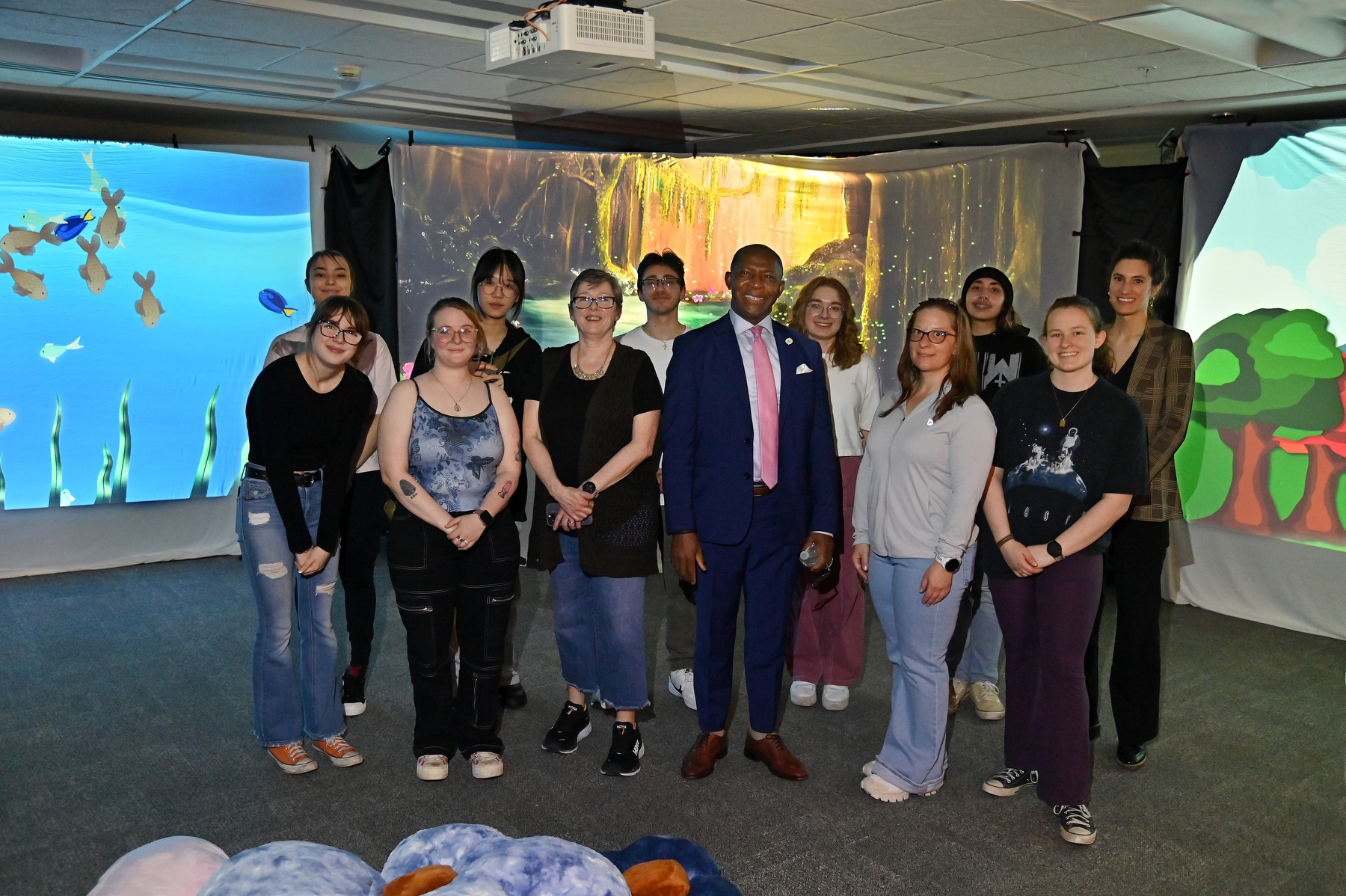 President Peter O. Nwosu visited with art students involved with the “Immersive Elements” art installation in Marano Campus Center on May 1.