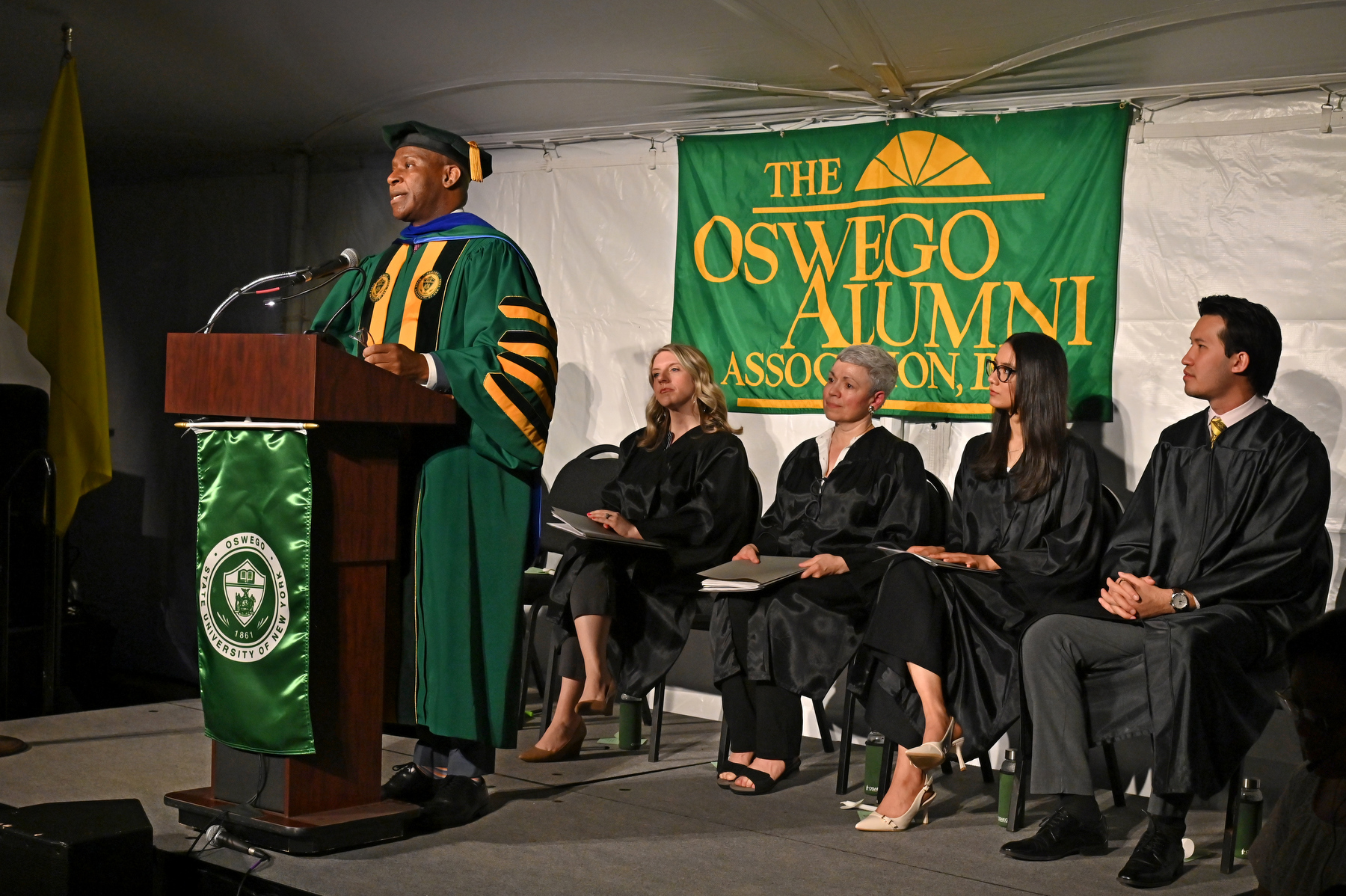 President Peter O. Nwosu speaks during the Commencement Eve Torchlight Ceremony on May 16.