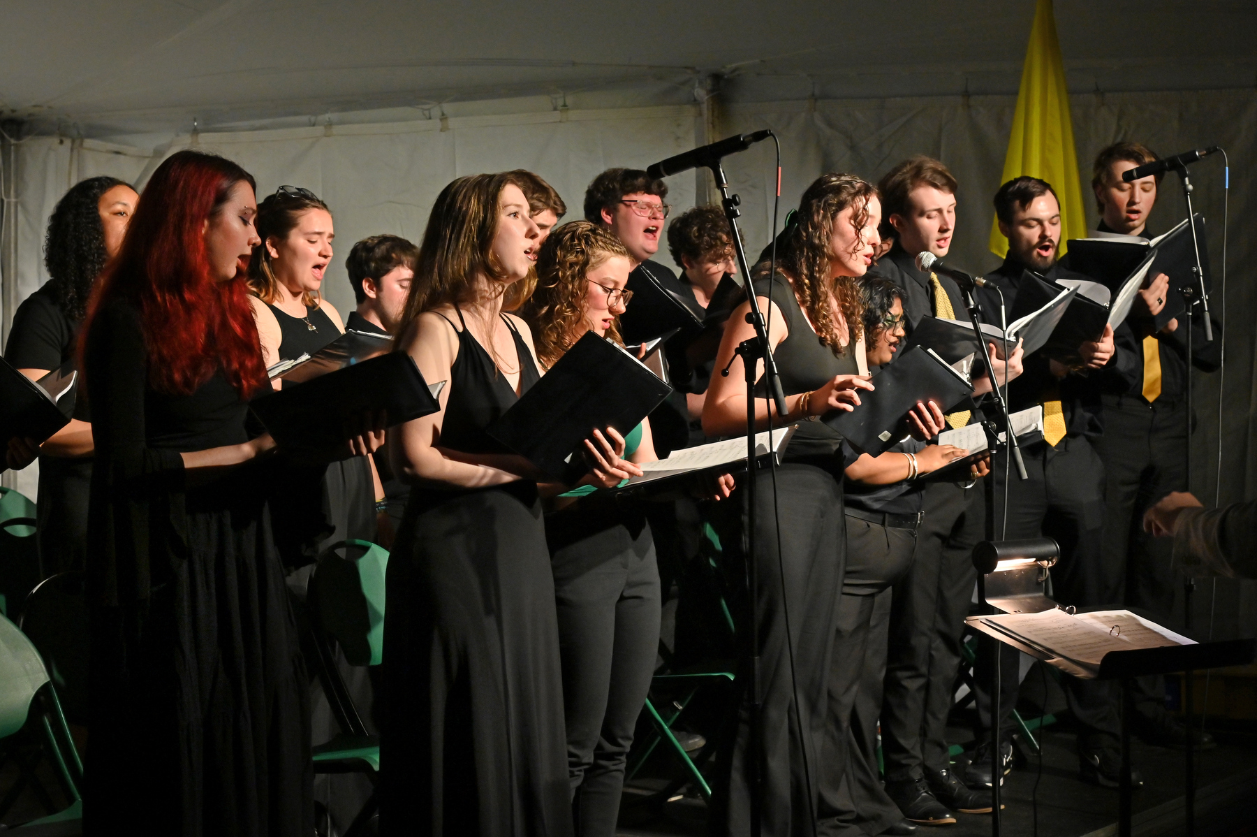 The Senior Sing is a melodic tradition during the Commencement Eve Torchlight Ceremony.