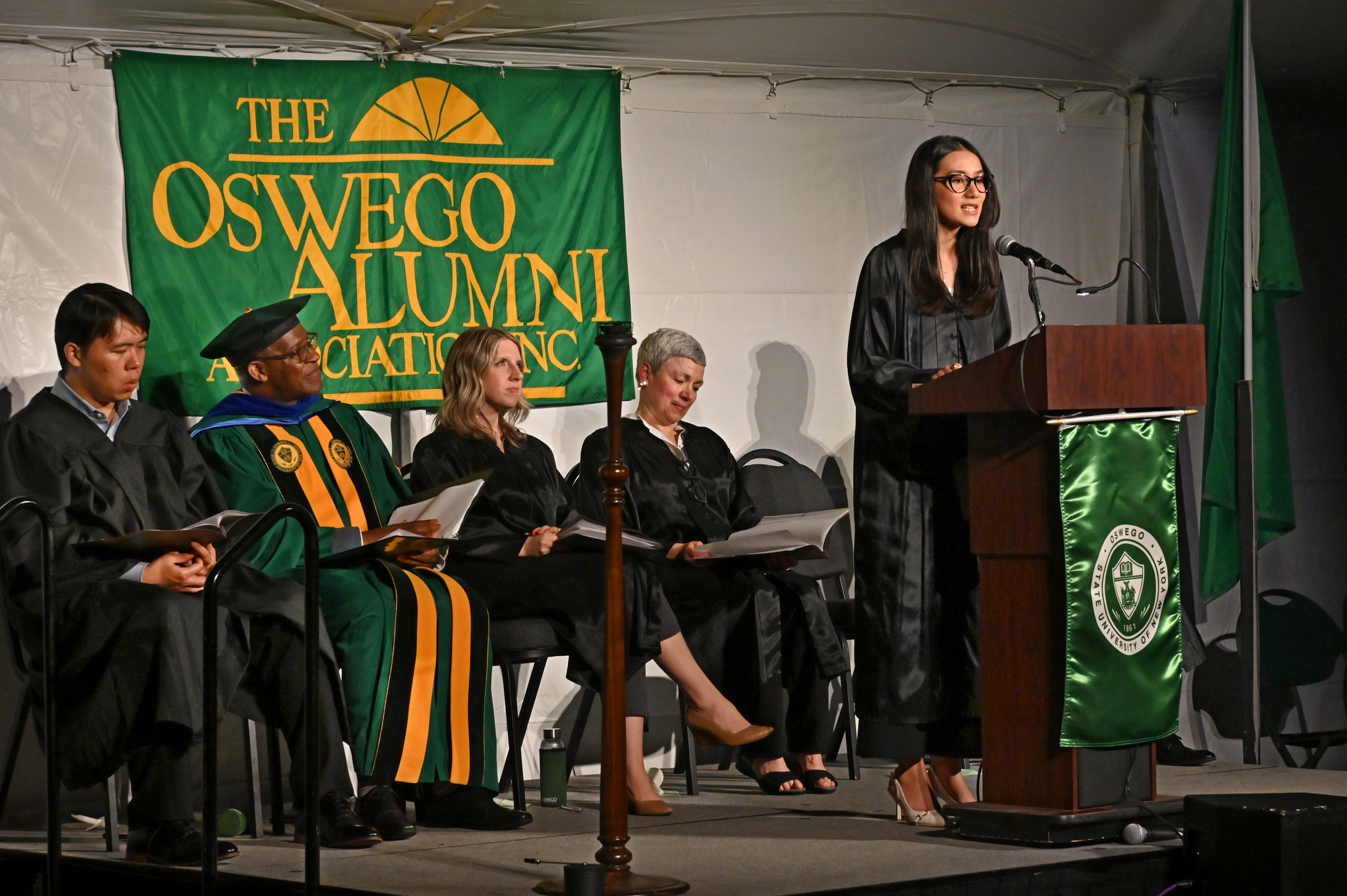 Clarissa Karki ’25, student speaker for the Commencement Eve Torchlight Ceremony May 16, offers remarks before the candles are lit.