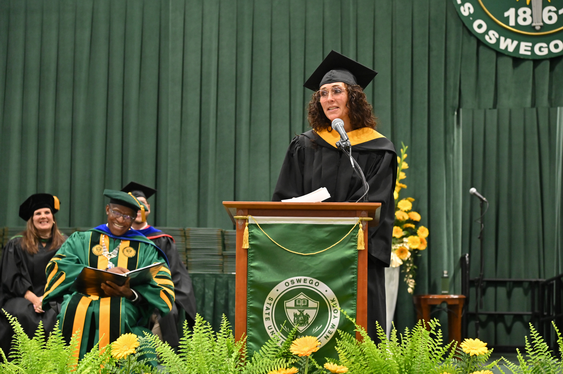 Constance Schwartz-Morini of the Class of 1990, the co-founder and CEO of highly successful SMAC Entertainment, provided the Commencement keynote for the School of Business ceremony.