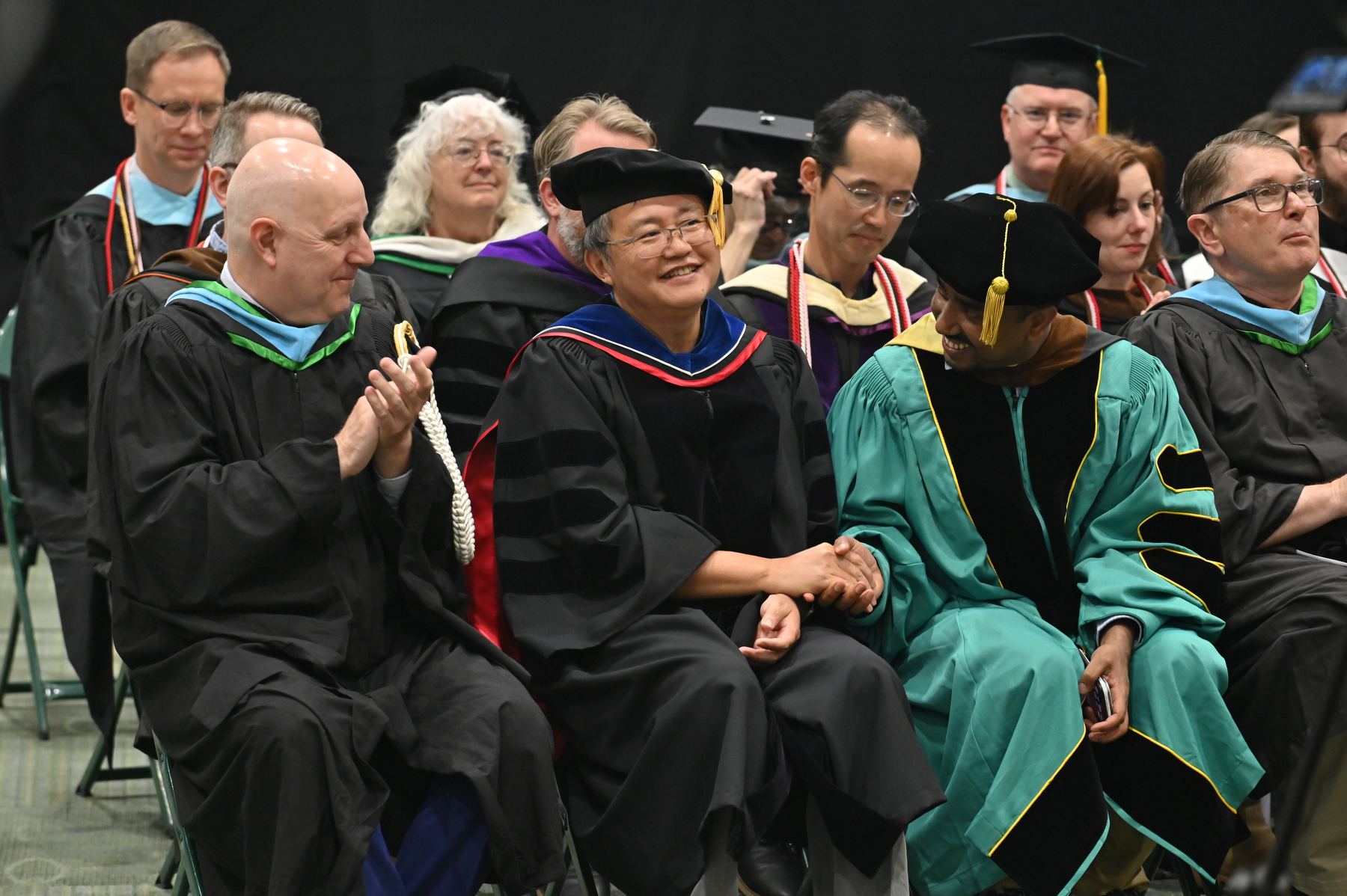 Retiring faculty member Bruce Peng of curriculum and instruction is recognized during the 4 p.m. ceremony.