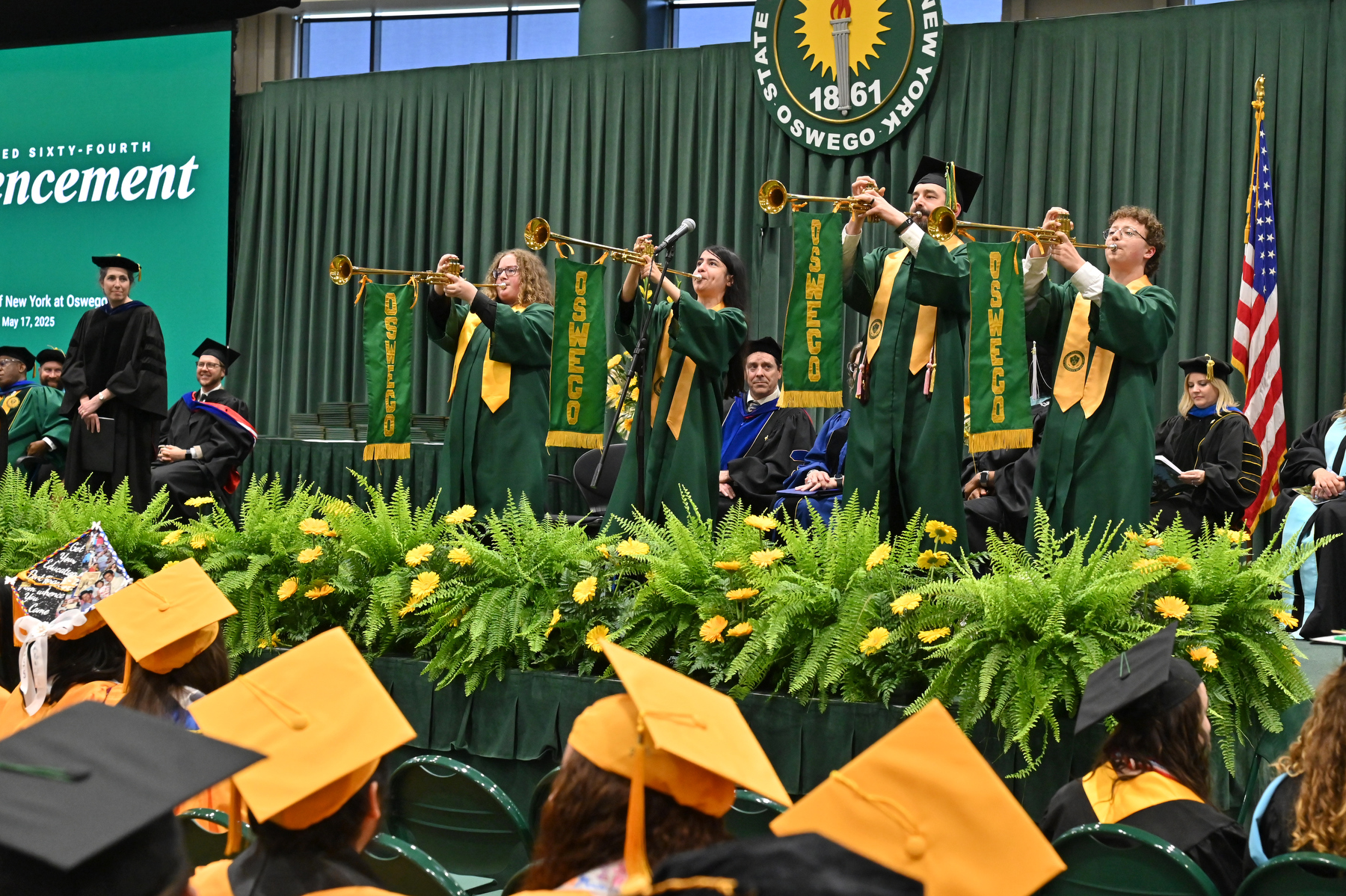 Trumpeters sound the conclusion of the 4 p.m. Commencement wrapping up a full day of three graduation ceremonies.