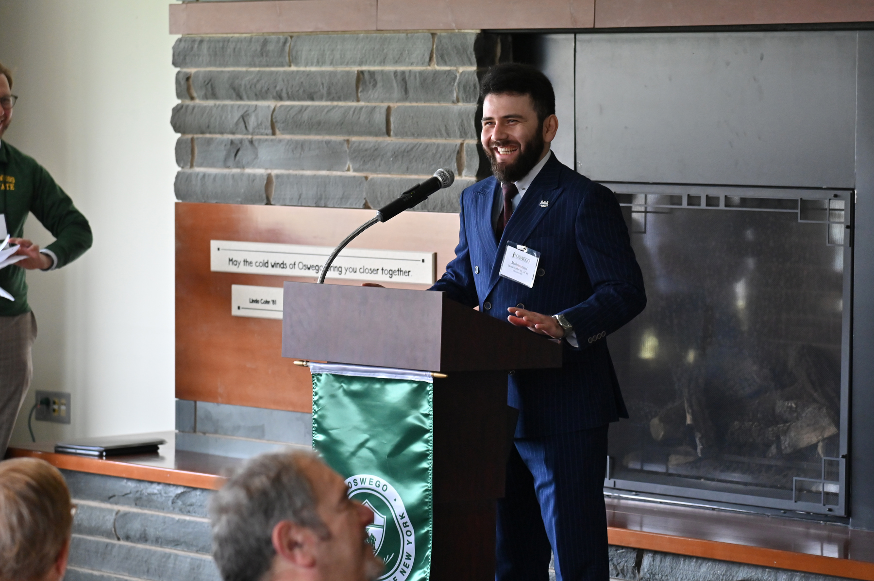 Muhammad Musozoda, who earned a bachelor’s in chemistry in 2023 and a master’s in chemistry in May 2025, speaks to guests at the Leadership Donor Recognition Reception in Marano Campus Center Hearth Lounge during Reunion Weekend. Musozoda spoke in appreciation of the opportunities at SUNY Oswego.