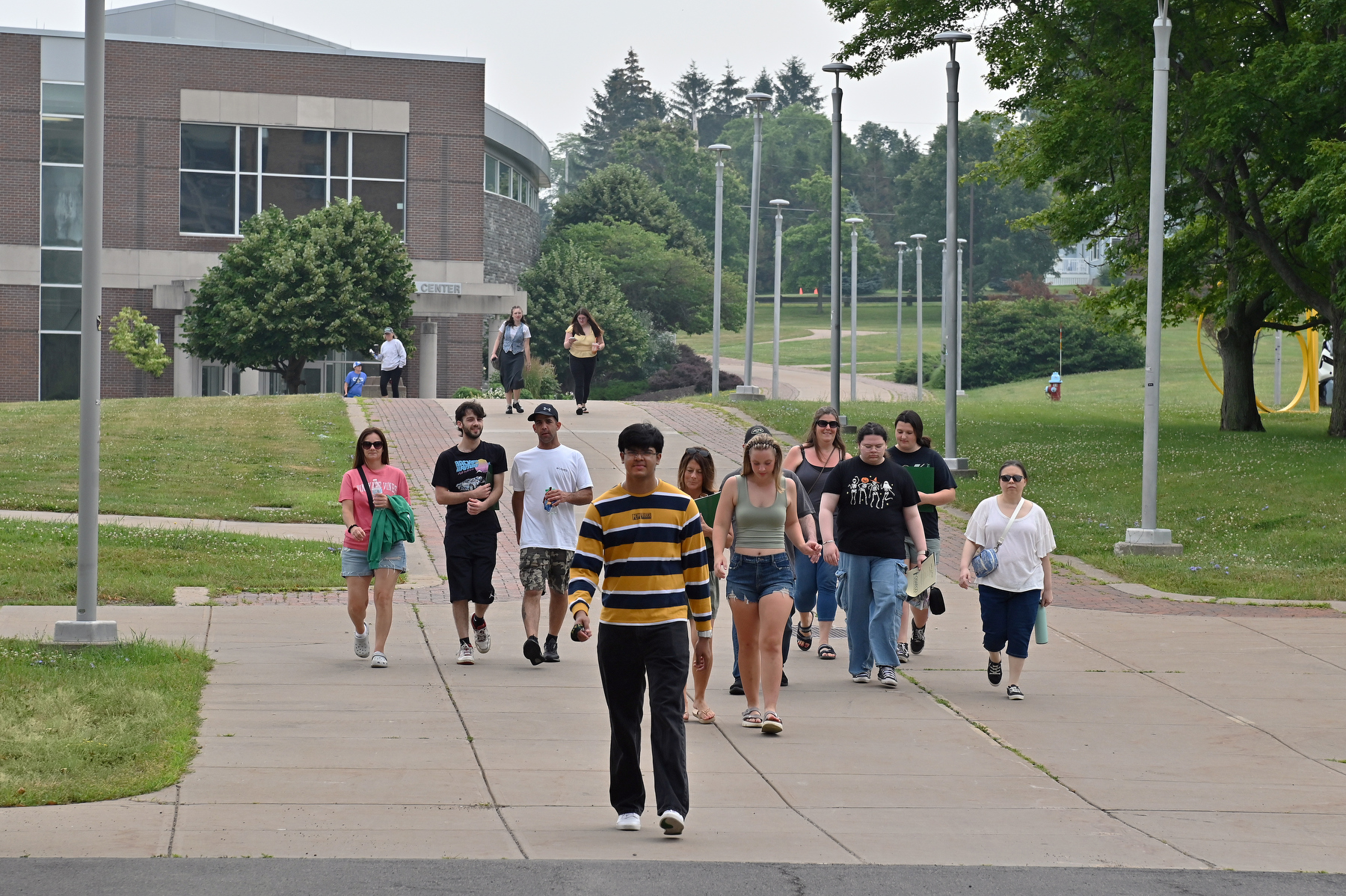 Aditya Raj Singh, a freshman computer science major, leads one of the many Admissions campus tours on July 14 for visiting prospective students and families.