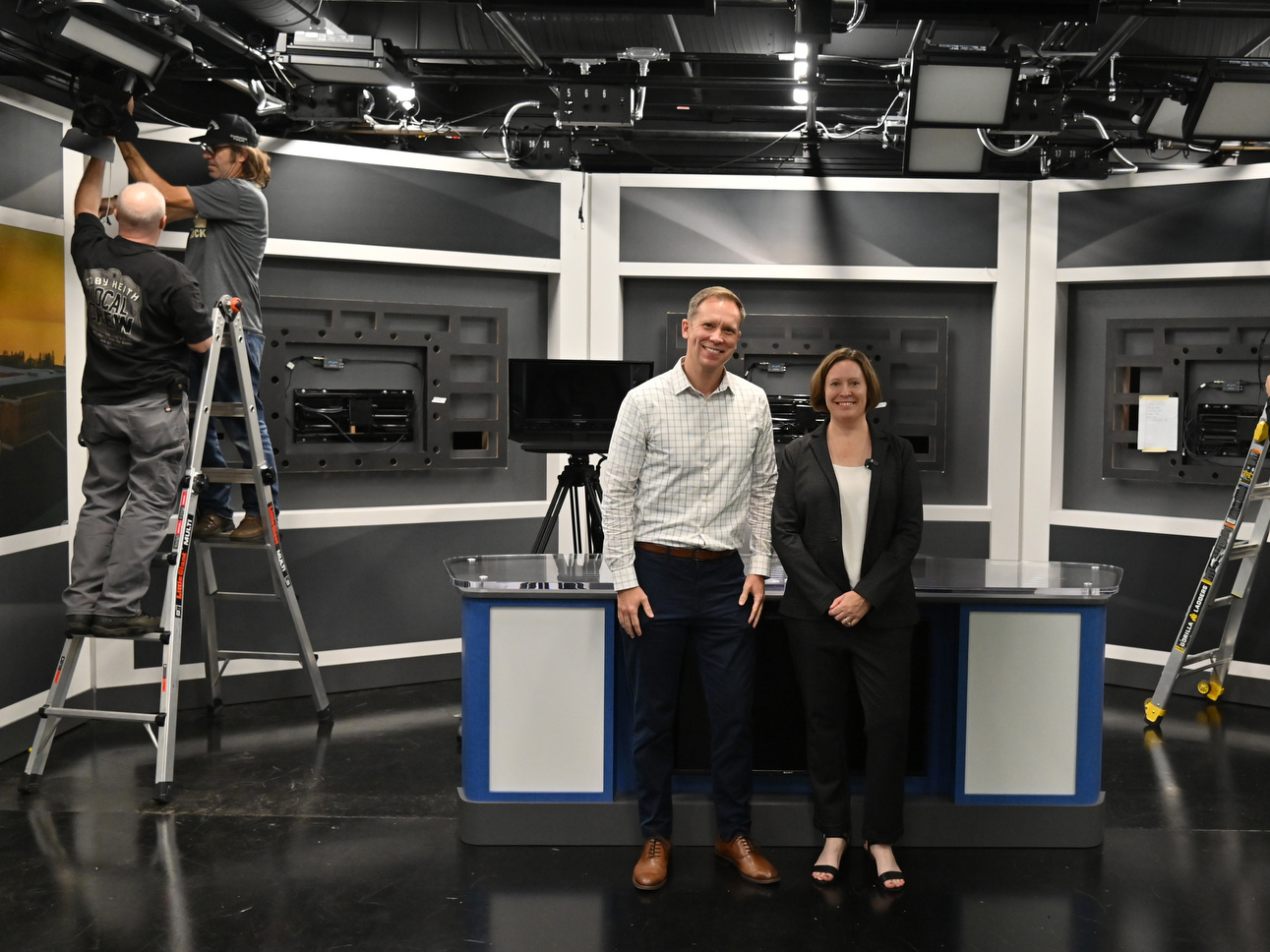 Before the start of classes in Hewitt Hall, Jennifer Knapp, dean of the College of Communication, Media and the Arts, and Michael Riecke, chair and associate professor of the communication studies, led a media tour, pausing here for a photo in a new broadcasting studio.