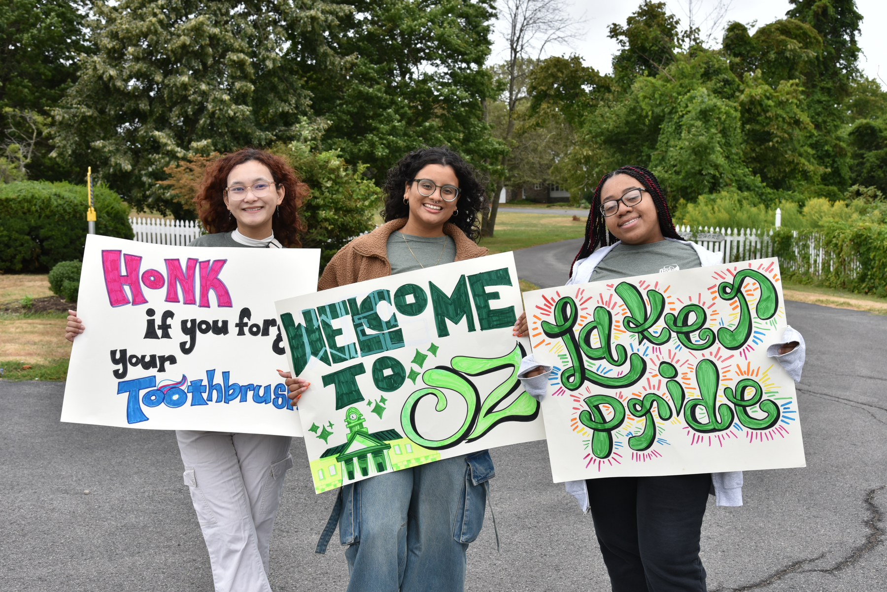 Move-in volunteers stationed around campus directed traffic and greeted the newest Lakers and their families coming to residence halls. This group located near Shady Shore are, from left: Kinjal Gurung, a sophomore broadcasting and mass communication major; Chloe Emestica, a senior creative writing major; and Lark Lee, a junior psychology and human development major.