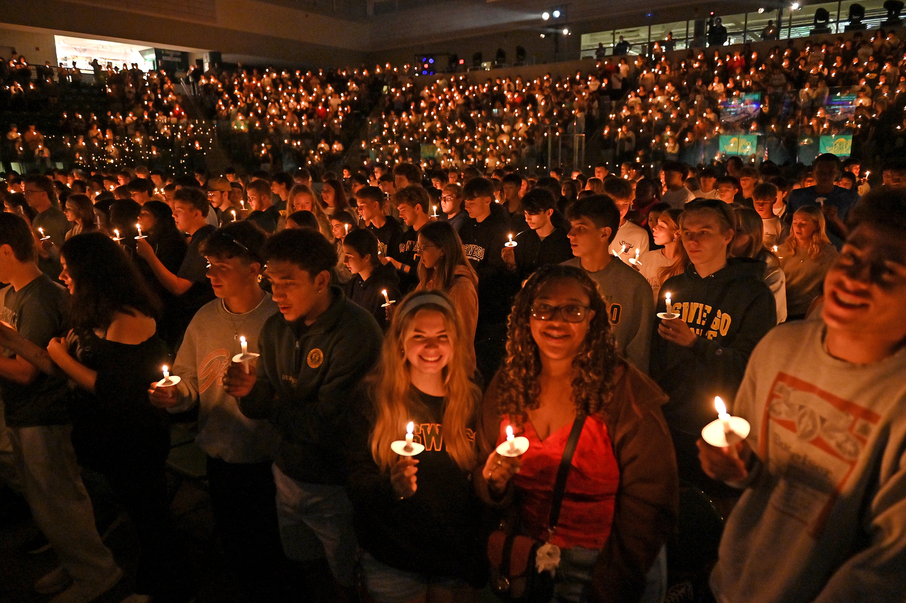The Welcoming Torchlight Ceremony includes incoming students lighting candles, symbolic of taking up the Torch of Learning as they begin their Laker journey.