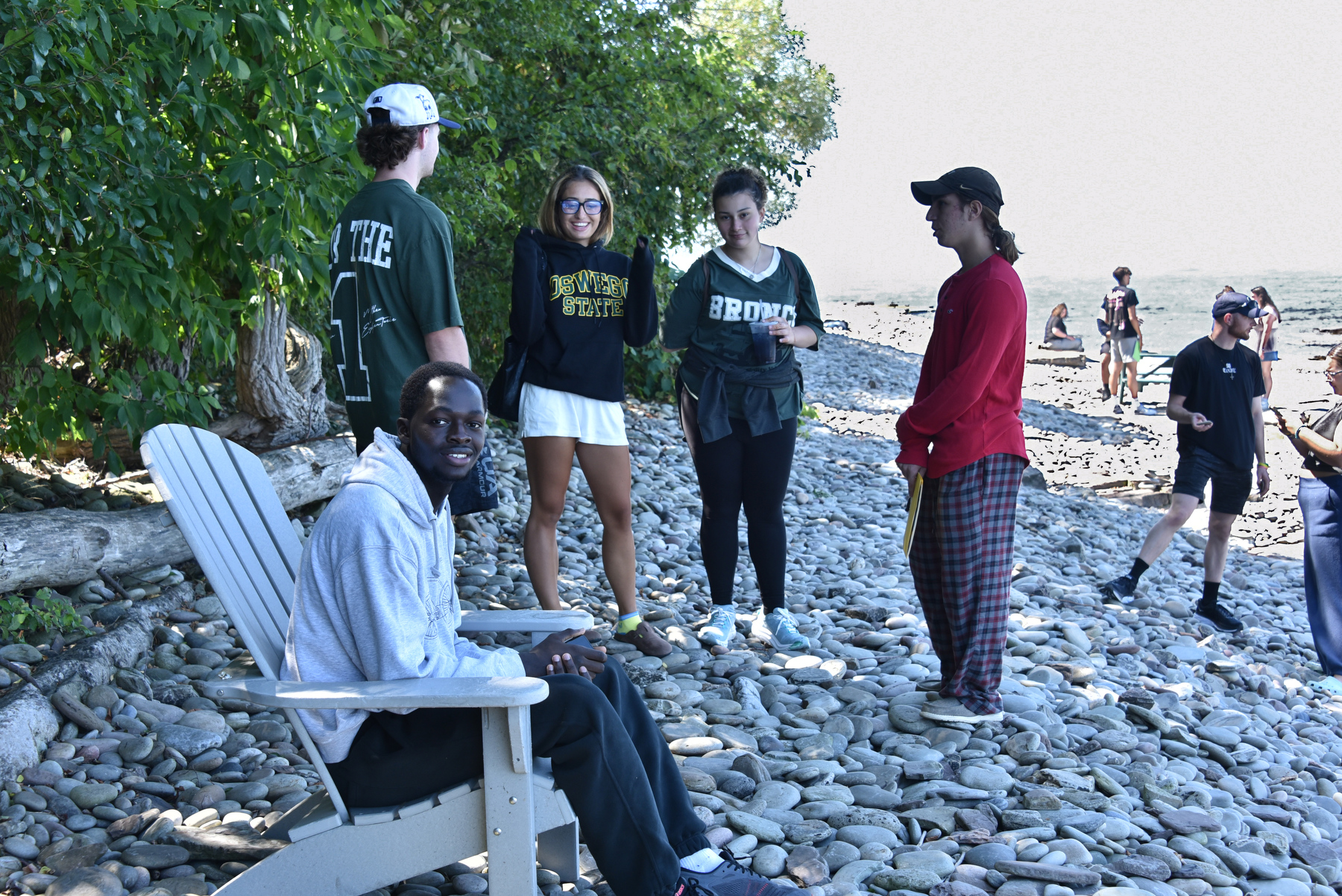 Students attending the Taste of Oswego picnic Aug. 22 also got to relax along the nearby Lake Ontario shore on a beautiful summer day.