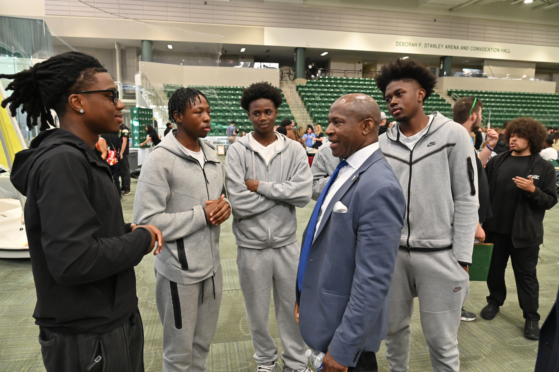 During the popular Student Involvement Fair, President Peter O. Nwosu talks with a group of first-year students from several African nations.