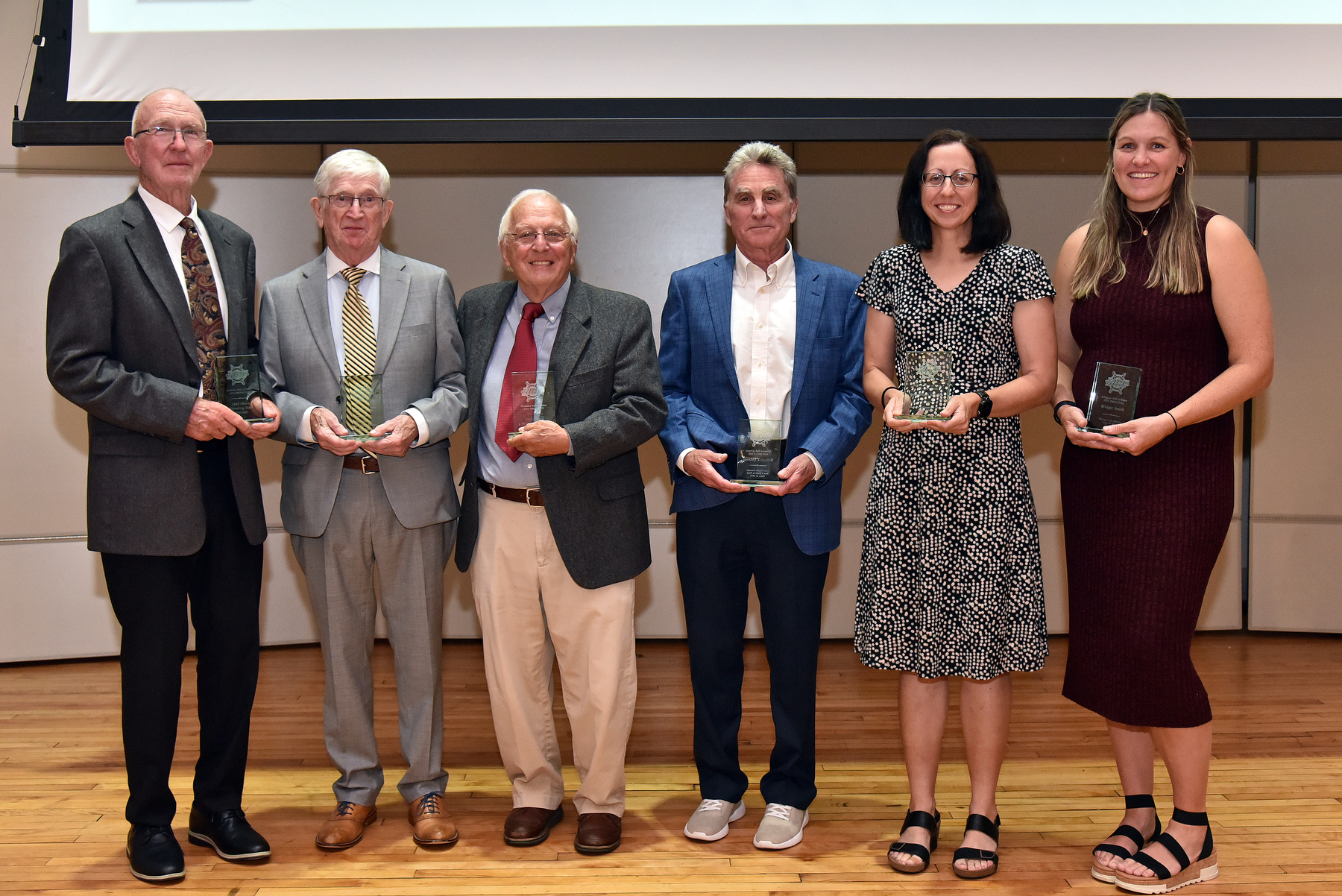 SUNY Oswego formally inducted the newest members of the Oswego State Athletics Hall of Fame on Oct. 4 in the Sheldon Hall ballroom, as part of a special ceremony recognizing their profound impact on Laker athletics. 