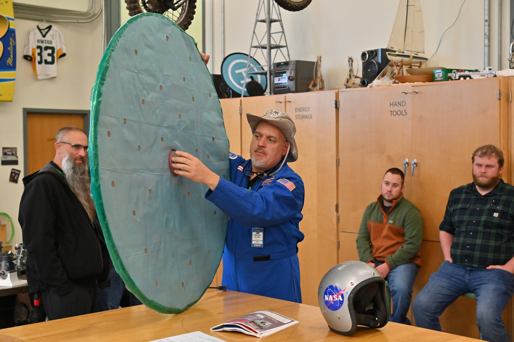 Alumni educators Greg Pitonza ‘90 (pictured) and Dwayne Heroth ‘88 presented “Up, Down and Upside Down - Aerodynamics, Hovercraft and Race Cars” in the Park Hall Transportation Systems Lab at the 86th annual Technology Fall Conference. Creations they showcased include this air-powered hovercraft capable of lifting an adult.