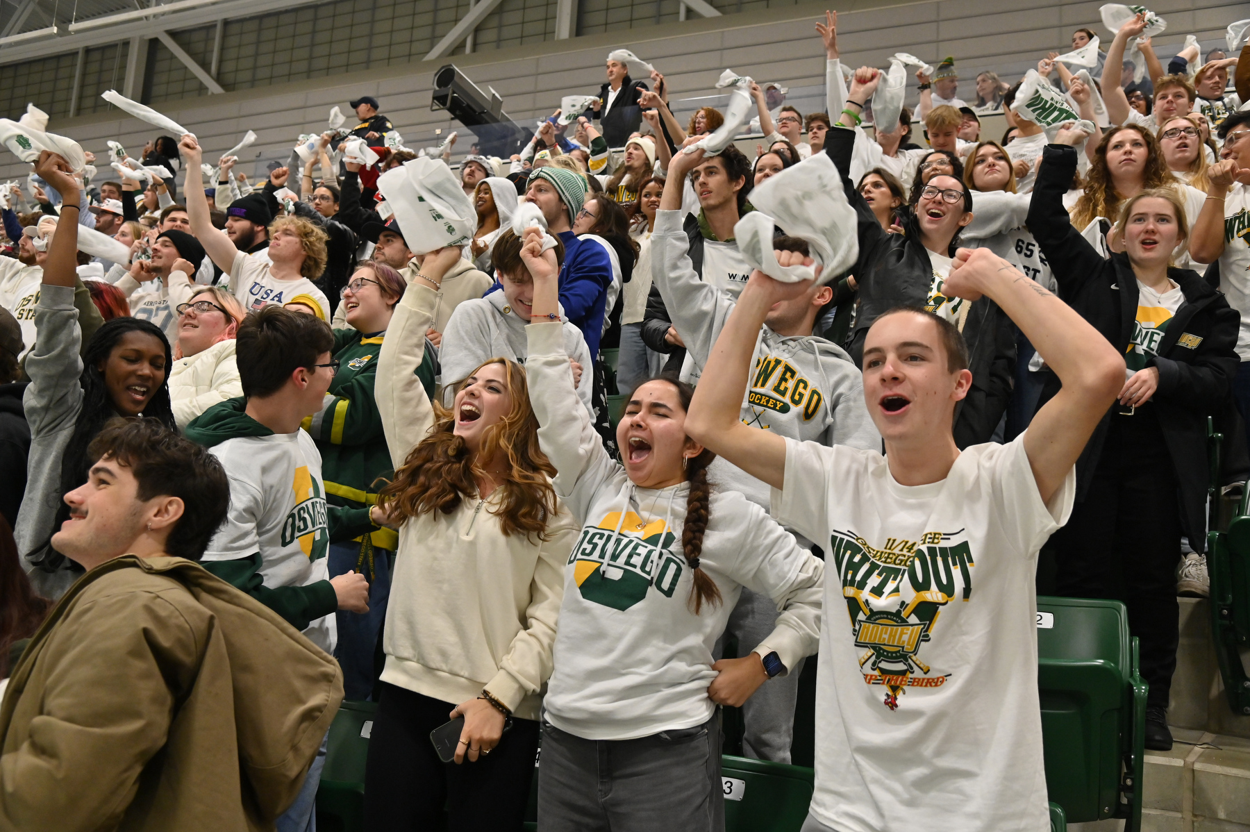 A packed, loud and proud crowd cheered the Oswego men's hockey team to victory over archrival Plattsburgh, 3-2 on a last-second goal, in this year's White Out game at the Deborah F. Stanley Arena and Convocation Hall on Nov. 14.