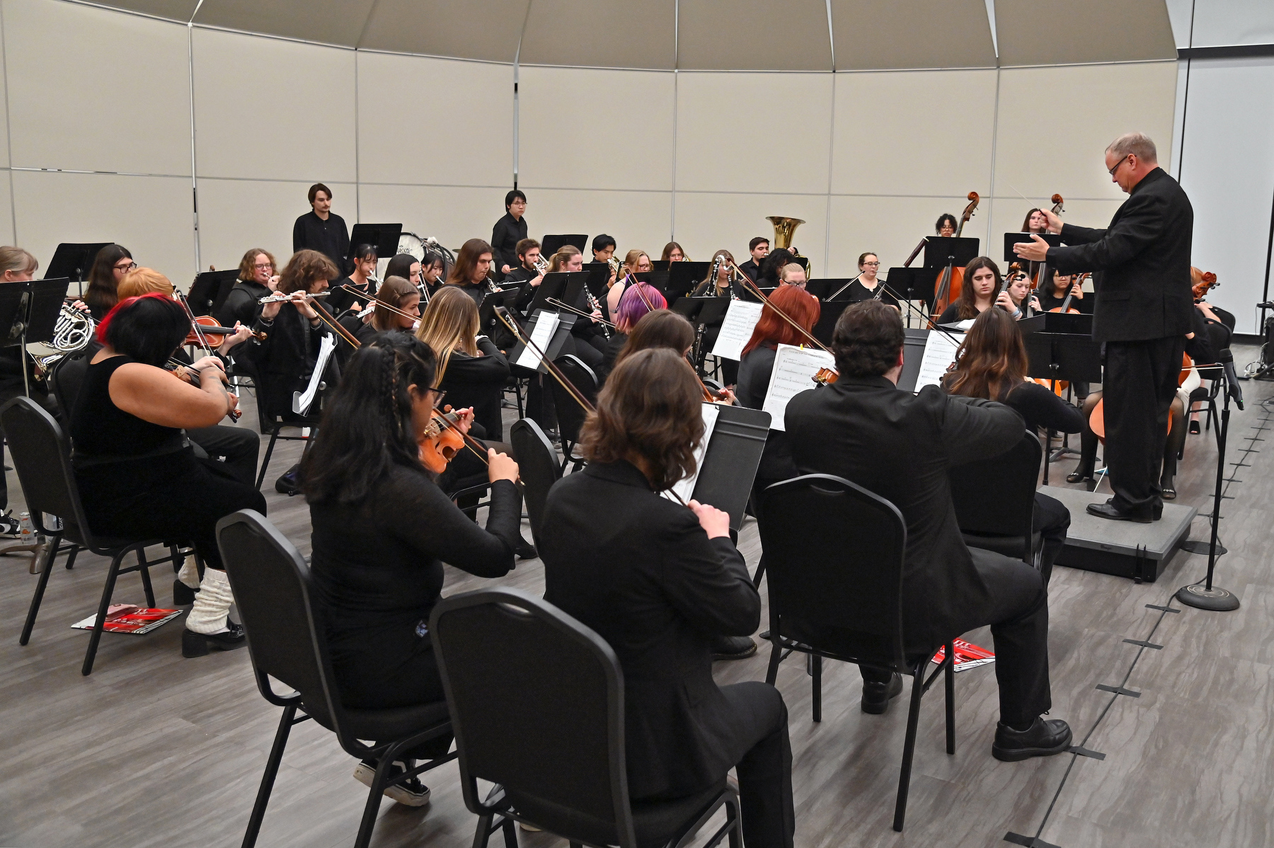 The annual winter College-Community Orchestra Concert, directed by music faculty member Trevor Jorgensen, entertained a wide-ranging audience on Dec. 3 in Hewitt Hall ballroom.
