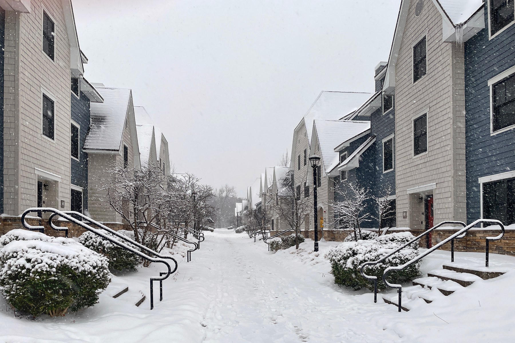 Snow fell across central New York beginning in the early morning on Dec. 10, the first widespread snow of the season, providing a picturesque backdrop in locations including The Village campus residence complex. (photo by Jennifer Broderick)