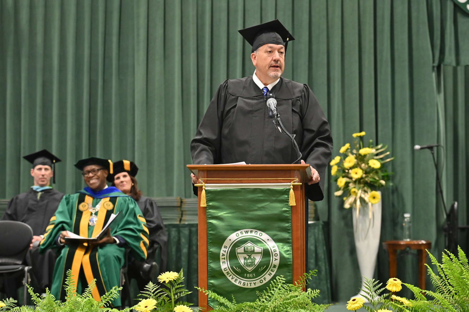 James A. Dowd '89, president and chief executive officer of Pathfinder Bank, served as the December Commencement speaker.