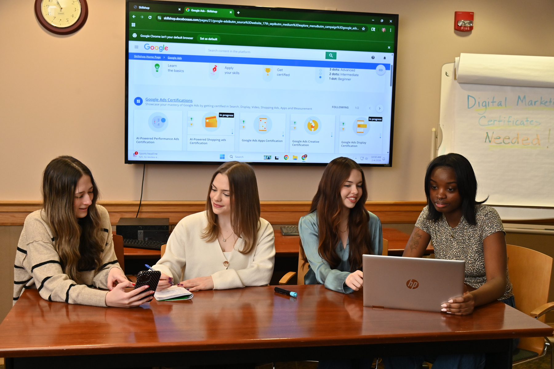 Students in the new digital marketing minor certification work in class in Rich Hall, from left: Kayla Tarquinio, senior business administration major; Teagan McGinn, senior marketing major; Olivya Tobin, senior marketing major; and Penelope Brown, junior marketing major 
