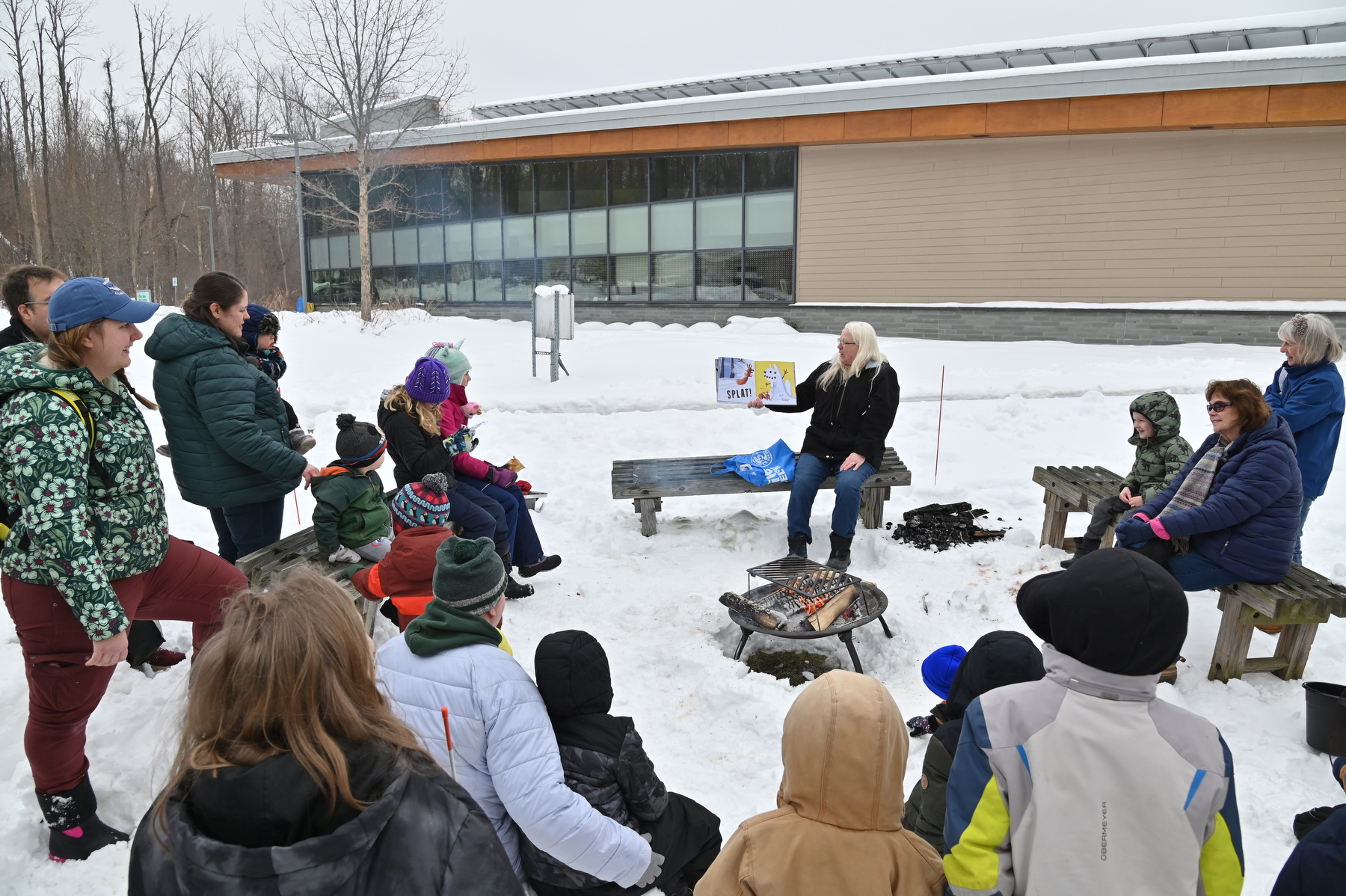 Rice Creek Field Station's annual Celebrate Snow Winter Festival included storytelling for children by the pavilion.
