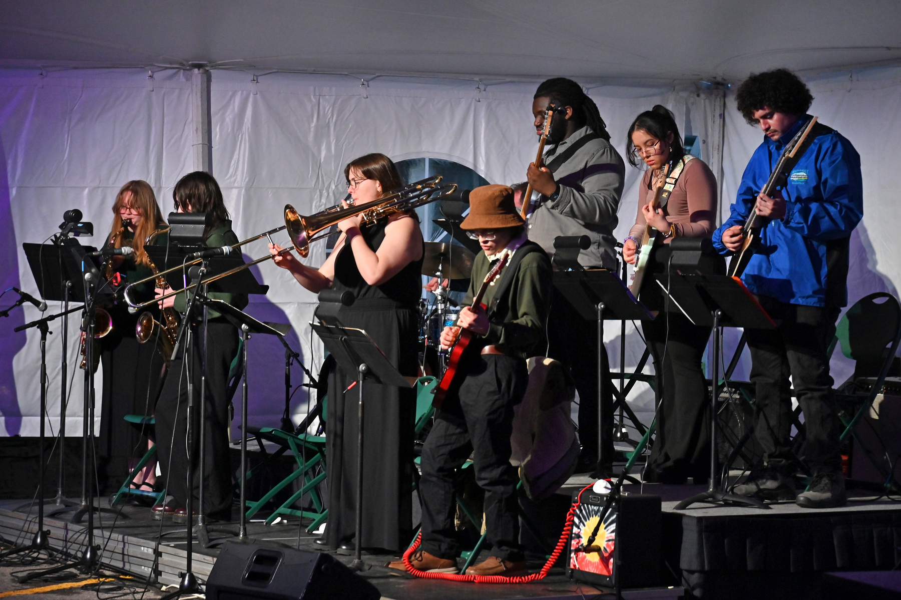 The Oswego State Jazz Ensemble, led by music professor Eric Schmidt, performed during the Commencement Eve Torchlight Ceremony