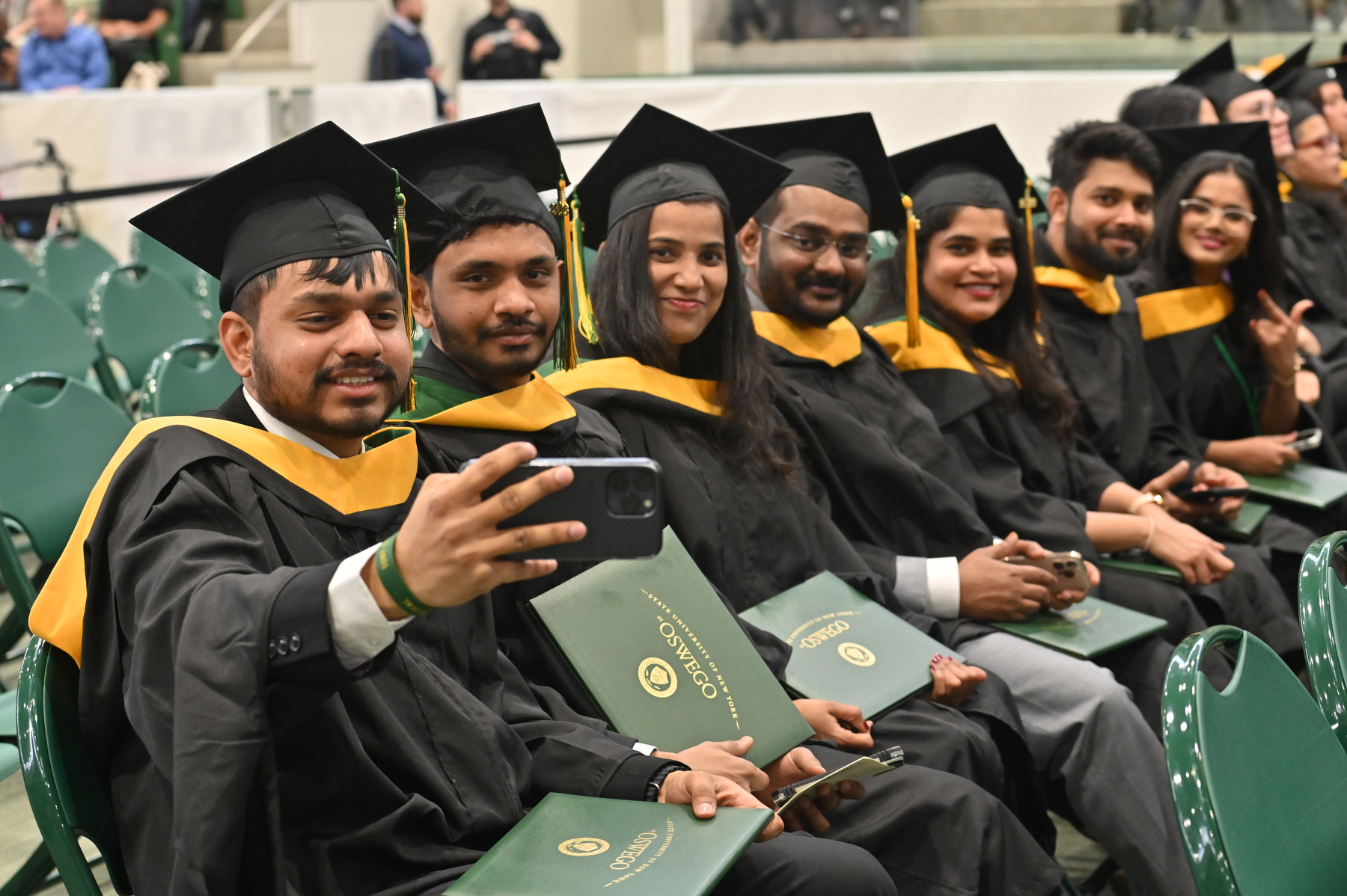 Graduates celebrate a picture-perfect moment at commencement.