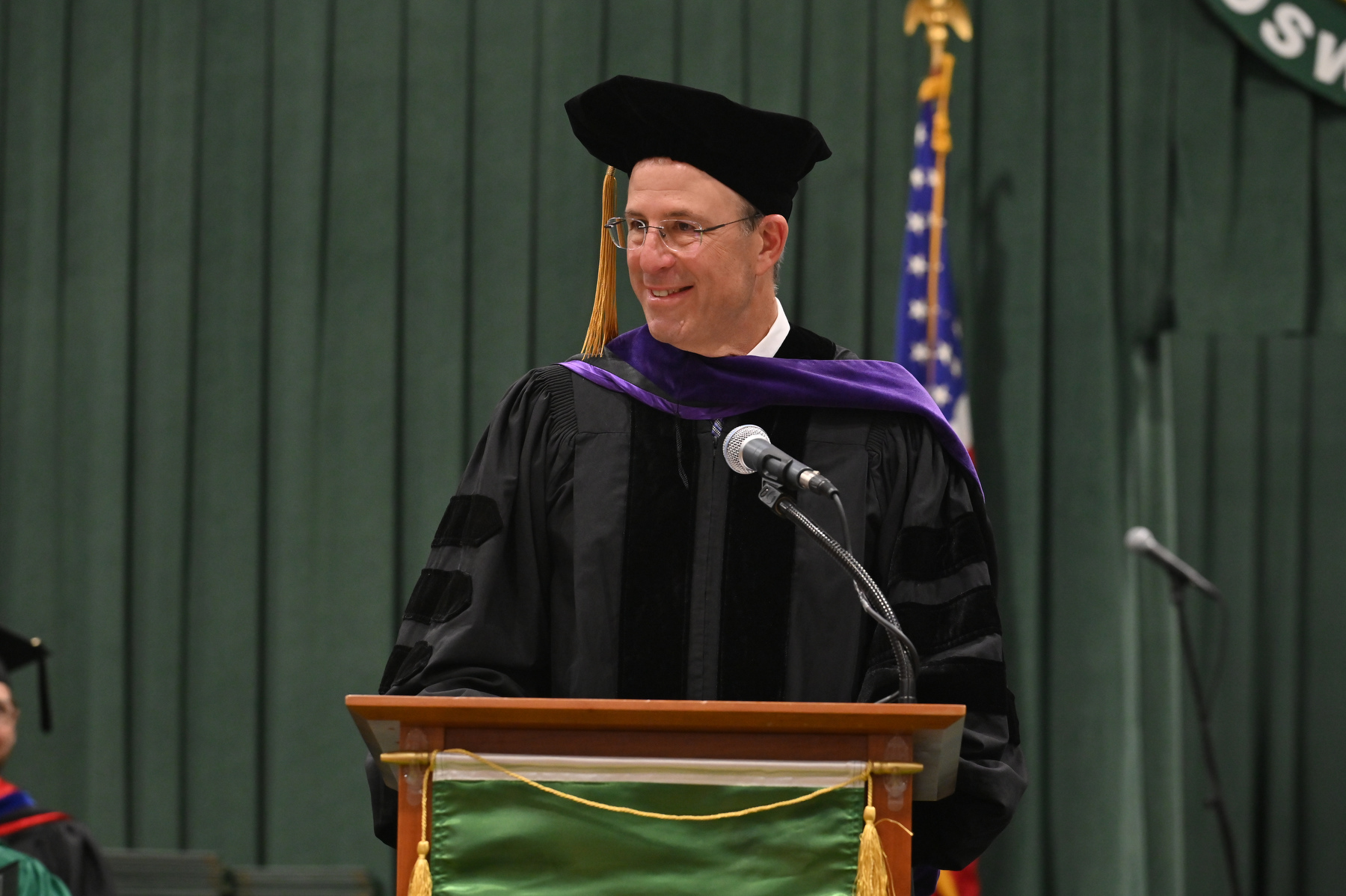 Steven Messina – a 1991 graduate and global head of the Finance Group at Skadden, Arps, Slate, Meagher & Flom LLC – provided the keynote for the 4 p.m. ceremony for the College of Communication, Media and the Arts and the College of Education, Health and Human Services. He also received an honorary doctorate from SUNY for his accomplishments and service.