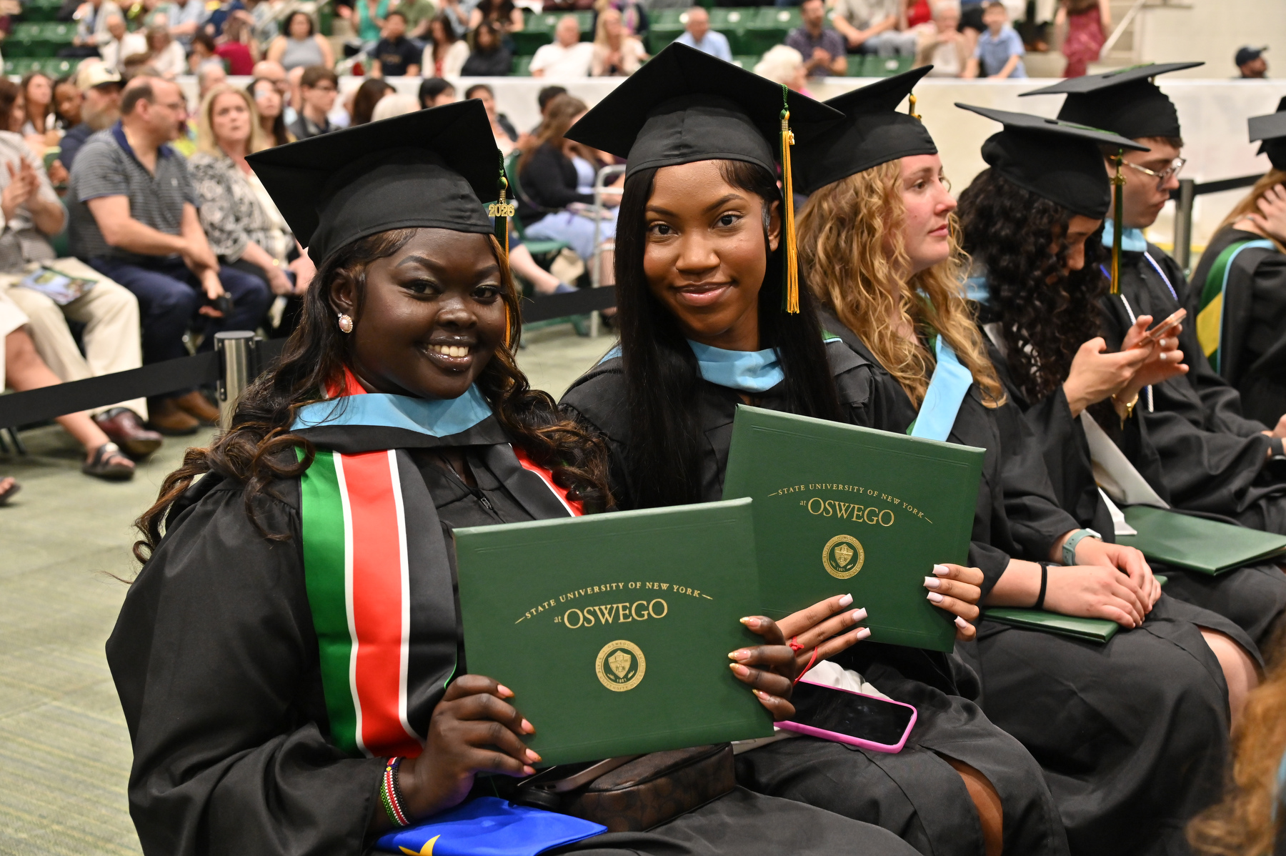 Students show pride in their achievements at commencement.