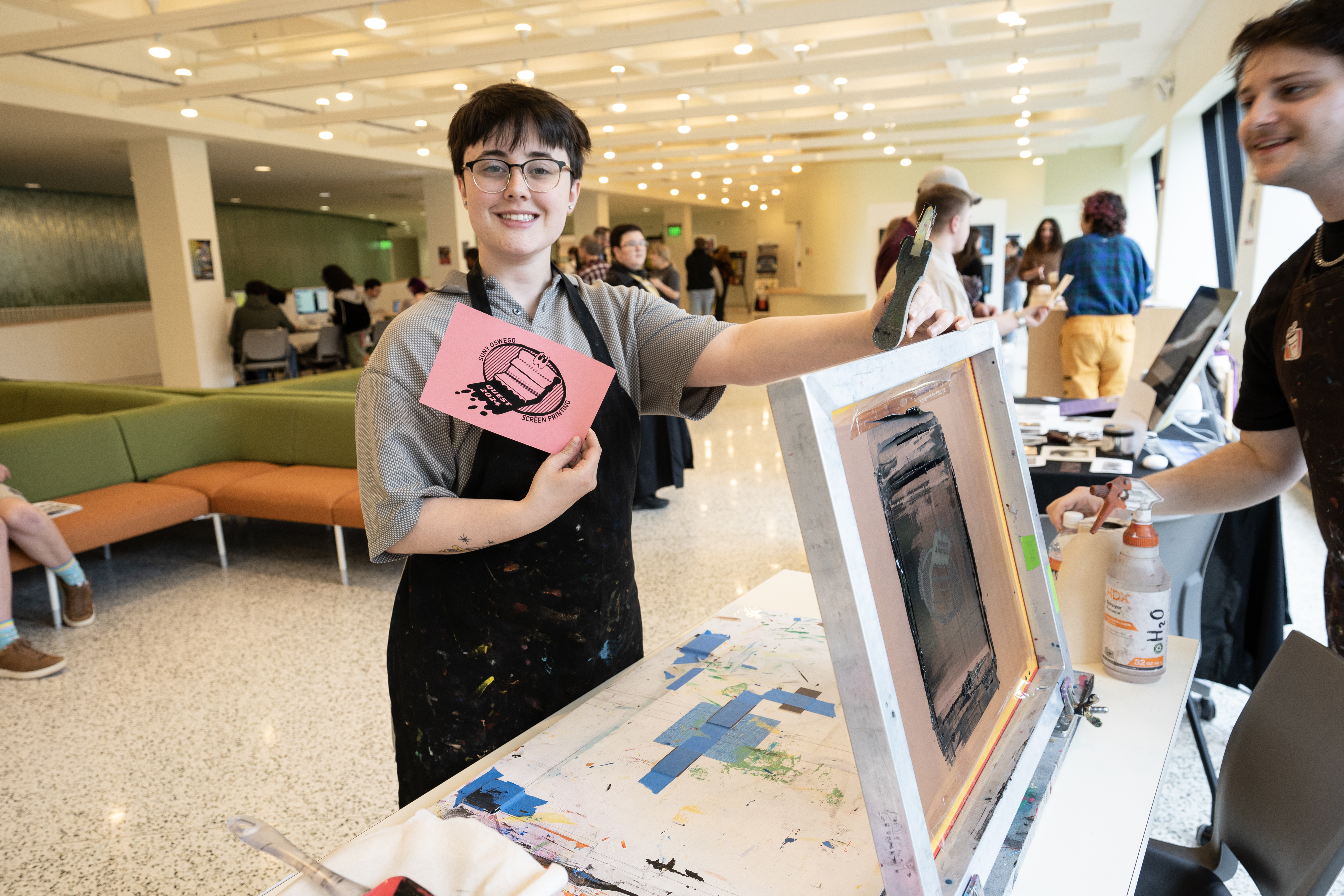 Olivia Taylor demos screen printing in Tyler Hall at Quest 2024.