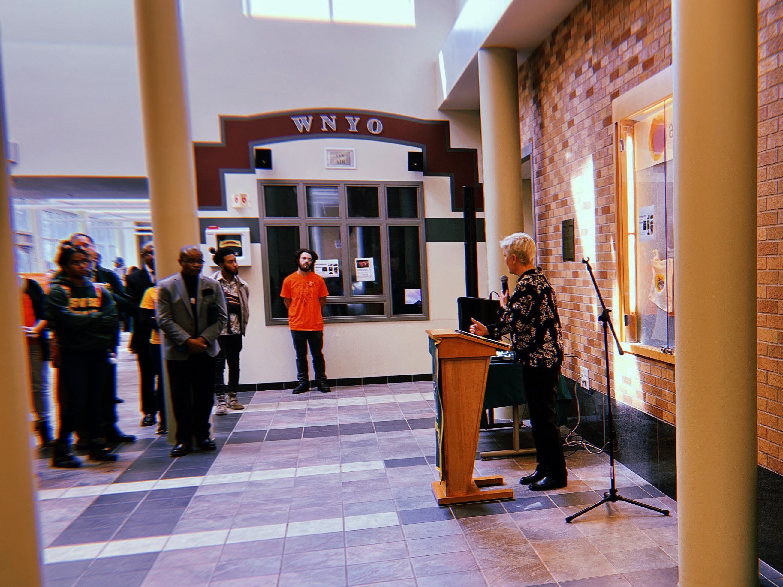 SUNY Oswego Officer in Charge Mary Toale speaks during a reception for SUNY Oswego's Flags of Nations on display in Marano Campus Center on Sept. 30. 