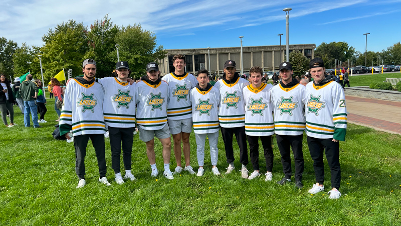 The Laker men’s hockey team shows off their Oswego pride during the Green and Gold photoshoot on Sept. 30. After sweeping two exhibition games, the nationally ranked team will open their season at home with the annual Teal Game at 7 p.m. Saturday, Oct. 28, vs. Elmira College in the Deborah F. Stanley Arena and Convocation Hall.