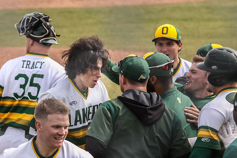 Baseball slugger Mike Dellicarri accepting congratulations after game-tying home run