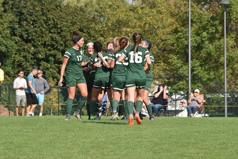 Women's soccer team in action