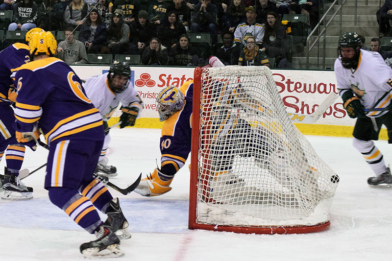 David Ferreira scoring a hockey goal