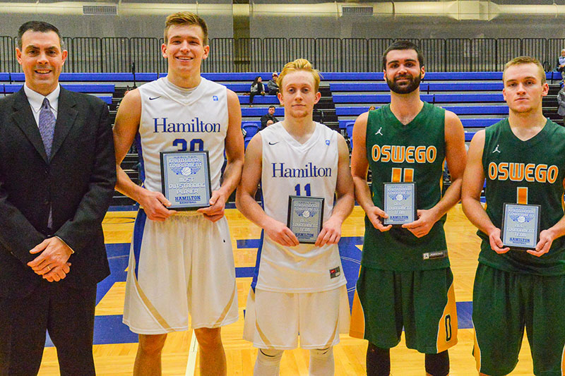 Hamilton All-Tournament Team stands with plaques