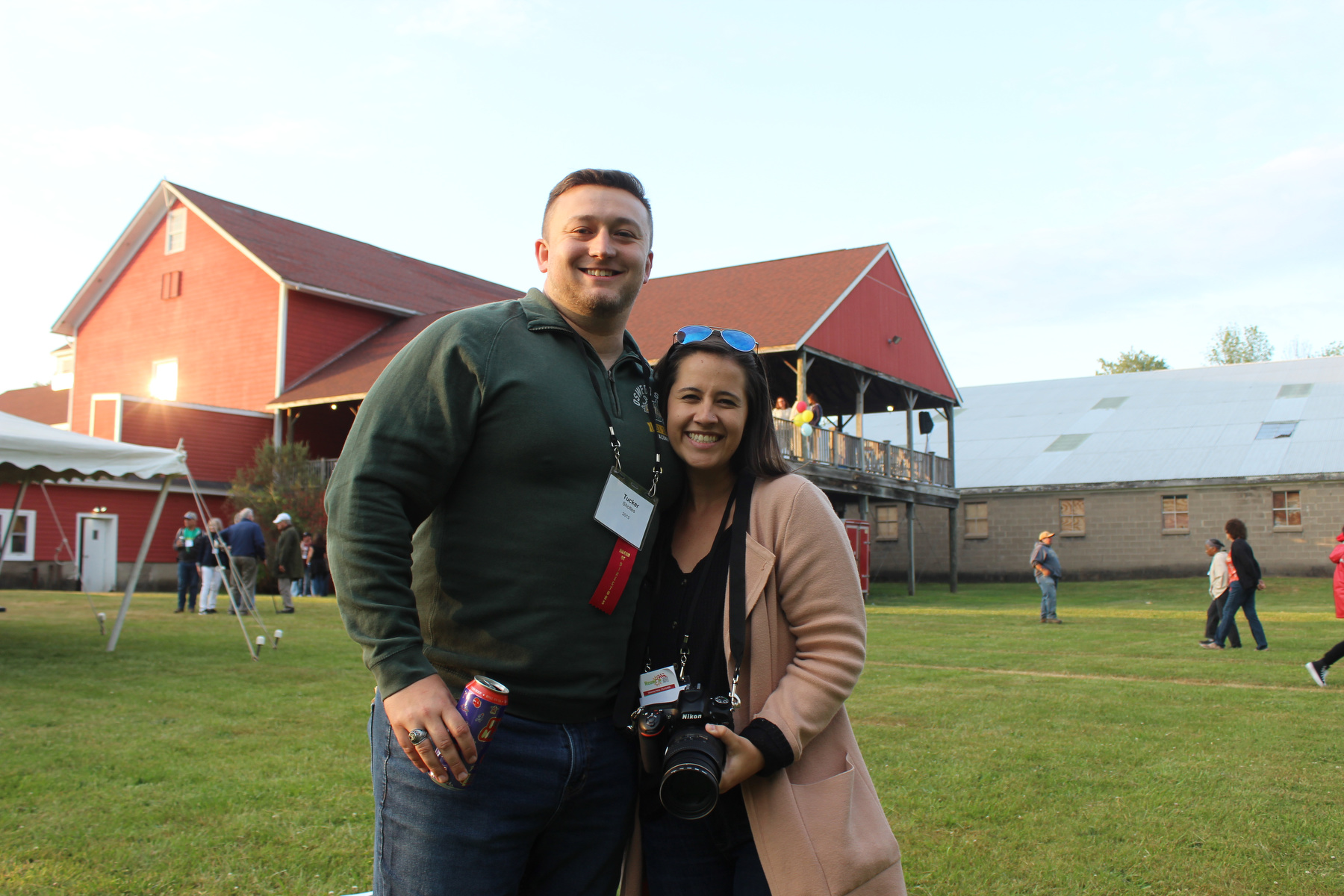 Tucker Sholtes, 2015 graduate and Alumni Association Board of Directors member, and then-fiancee Hope Wearing -- who celebrated their wedding over this past weekend -- enjoy the Welcome Back BBQ at Fallbrook.