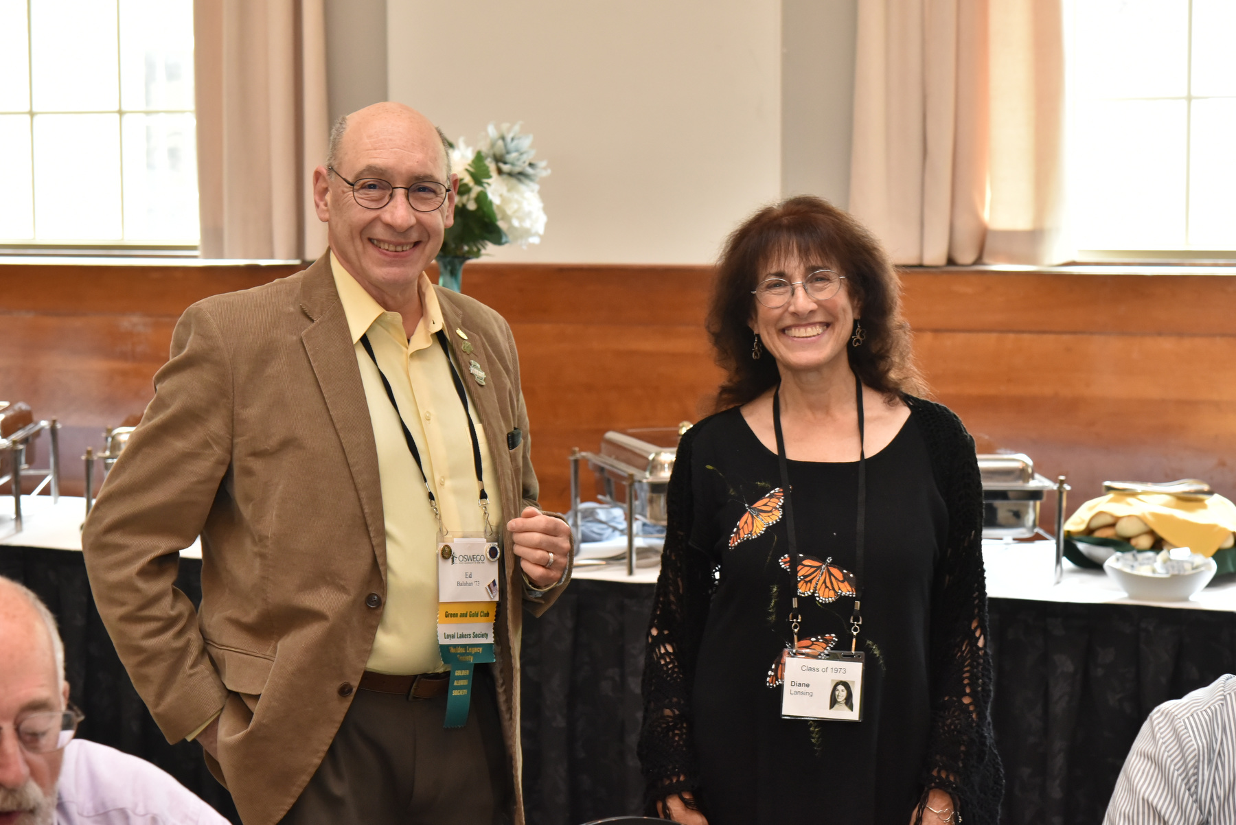 The Reunion Weekend's reception and luncheon for alumni from the Class of 1973 and prior, held in Sheldon Hall ballroom, provided classmates with the chance to catch up. Pictured are 1973 classmates Ed Balaban and Diane Lansing.