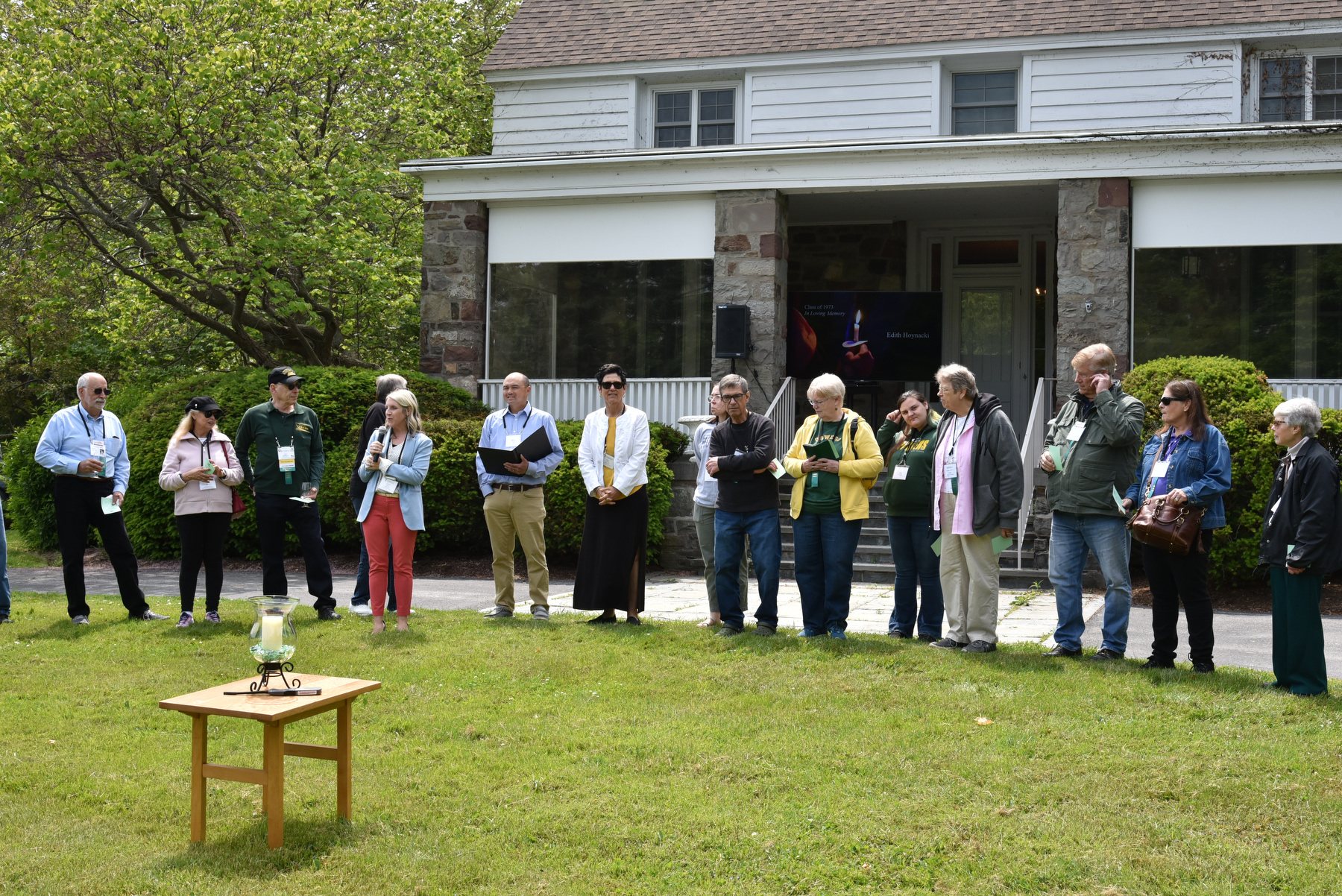 The Remembrance Ceremony was held at Shady Shore during the class of 1973 reception held at Shady Shore. Officiating the event was Laura Pavlus Kelly ’09, executive director of the Oswego Alumni Association, Inc. and director of alumni engagement; and Michael Huynh, director of campus ministry for the Hall Newman Center at SUNY Oswego.