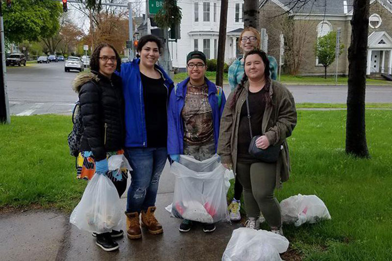 Young people clean up litter